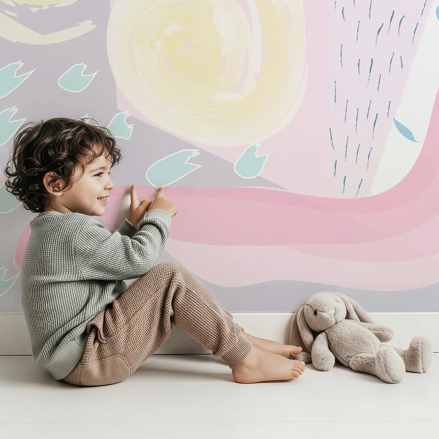 Child in front of Whimsy Tots Abstract Pastel Collage Wall Mural with abstract, pastel, shape, collage, doodle, pink, purple, yellow in design.