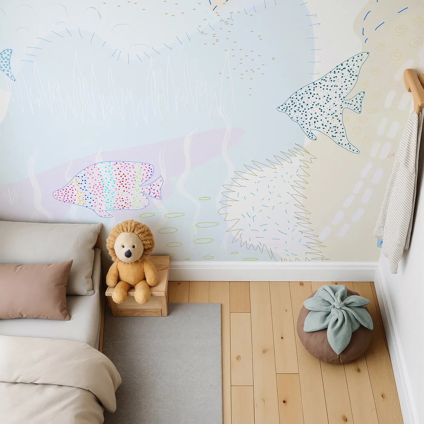 Top-down view of Whimsy Tots' Dotted Fish Friends Wall Mural (Turn Their Room into a Quirky Underwater World).Gender-Neutral