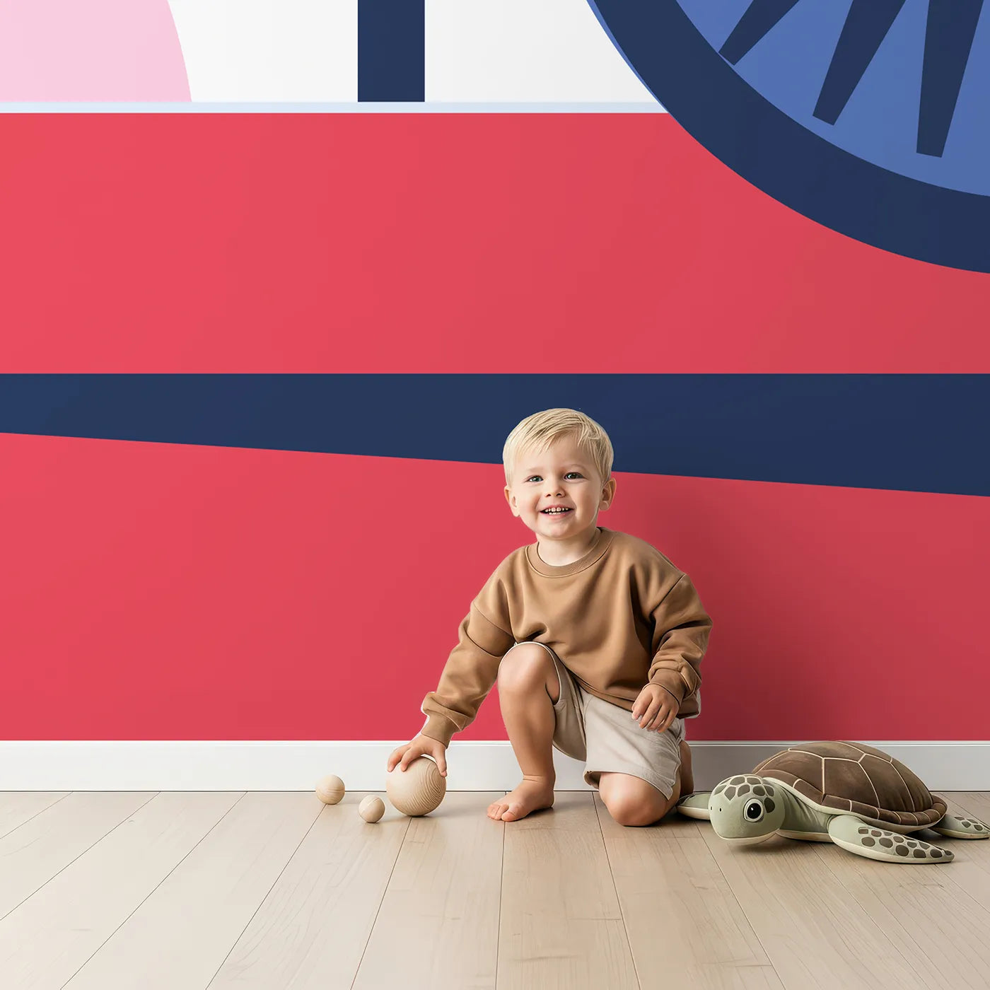 Child in front of Whimsy Tots Retro Airport View Wall Mural with airplane, airport, plane, travel, retro, red, blue, engine in design.