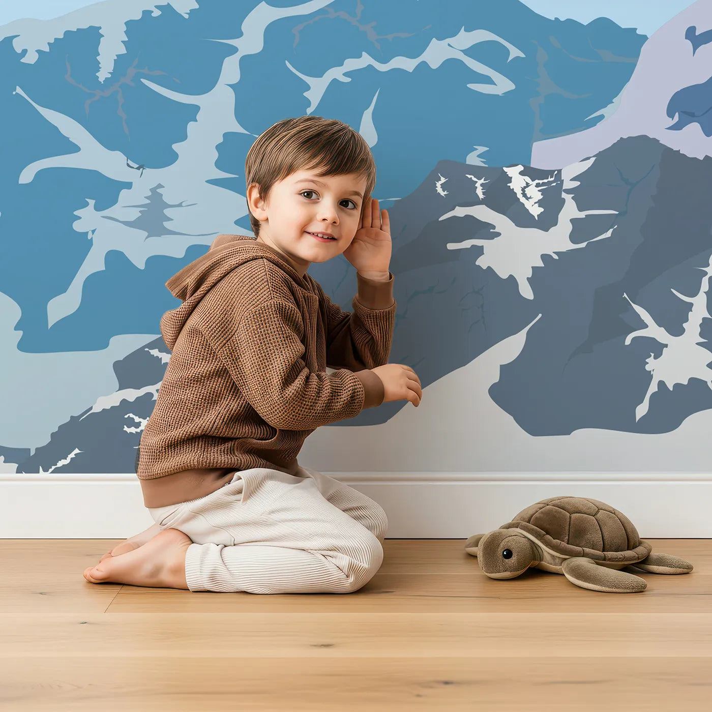 Child in front of Whimsy Tots Mountain Flight Wall Mural with airplane, mountain, snow, sky, fly, travel, landscape, plane in design.