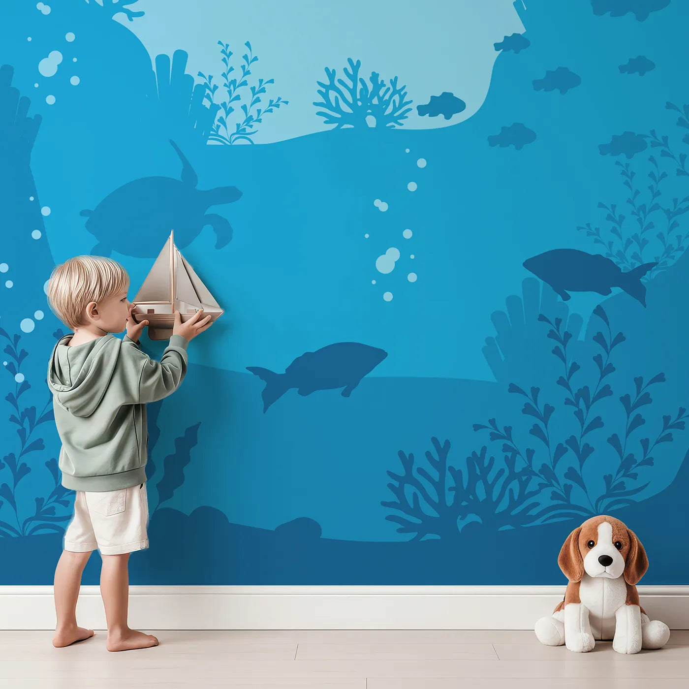 Child in front of Whimsy Tots Underwater Kingdom Silhouette Wall Mural with ocean, sea, underwater, silhouette, blue, turtle, fish, coral in design.