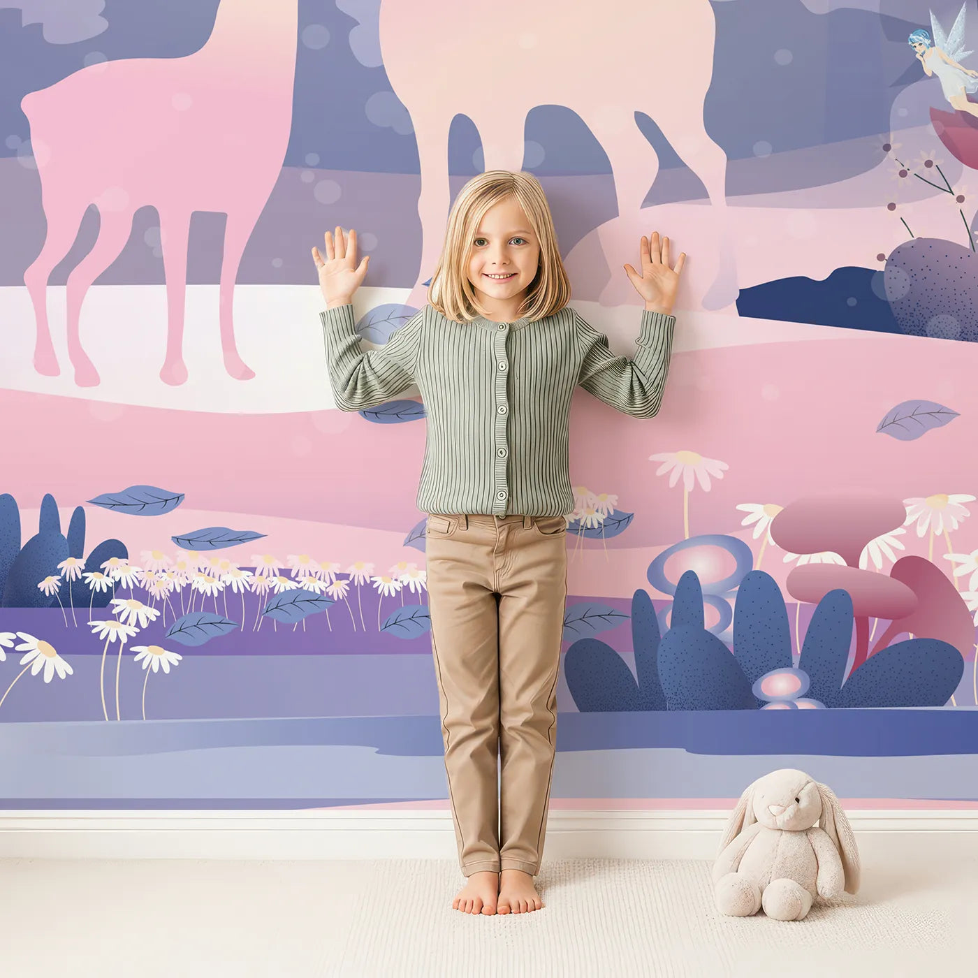 Child in front of Whimsy Tots Enchanted Winter Forest Wall Mural with forest, winter, deer, fairy, magic, sparkle, pink, purple in design.