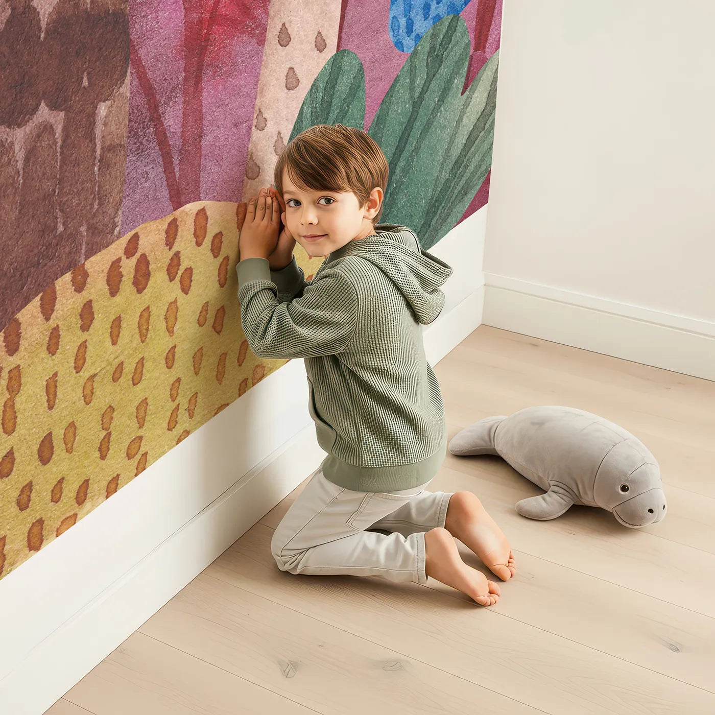 Child in front of Whimsy Tots Abstract Watercolor Forest Wall Mural with forest, tree, abstract, watercolor, colorful, landscape, modern, art in design.