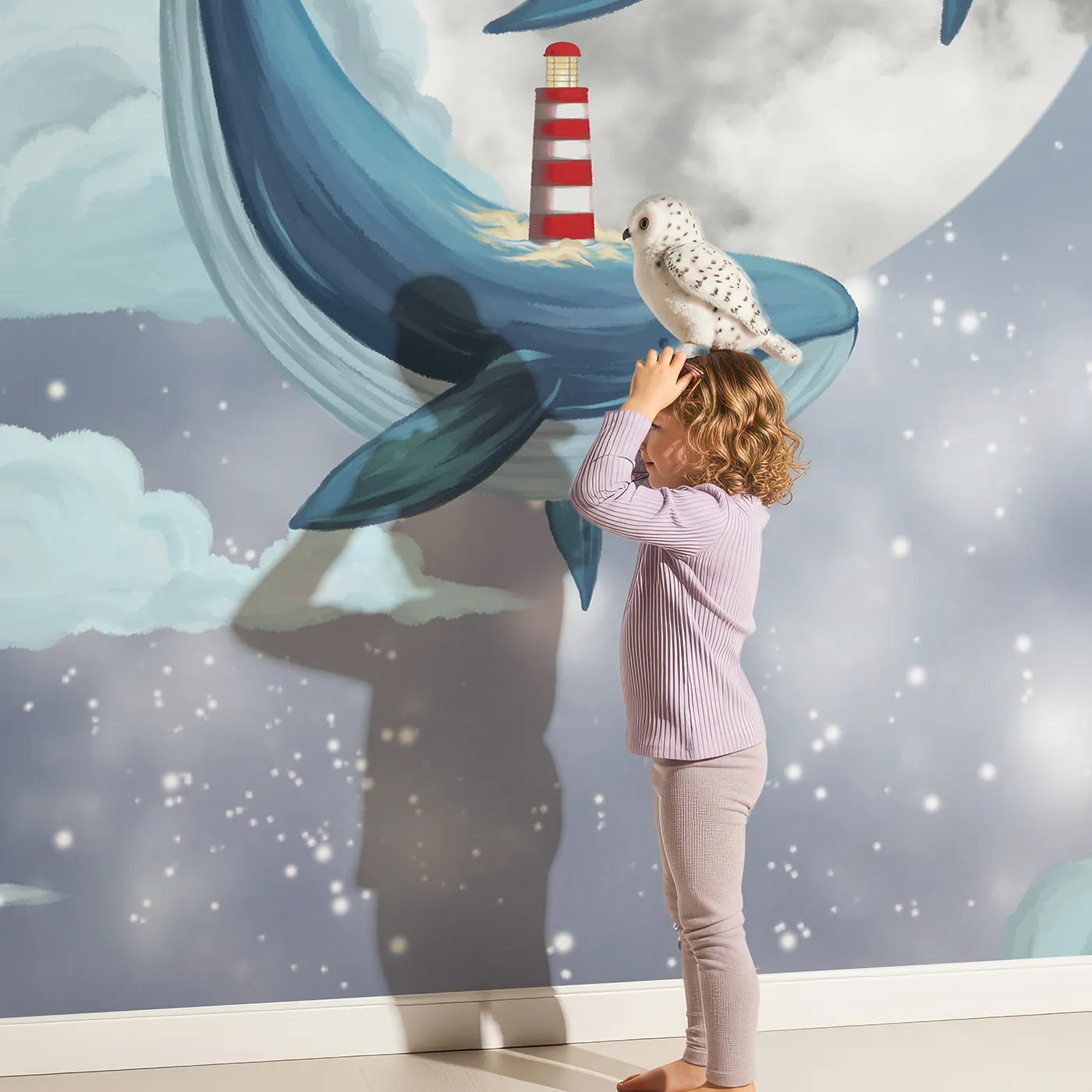 Child in front of Whimsy Tots Flying Lighthouse Whales Wall Mural with whale, flying, lighthouse, moon, cloud, sky, fantasy, surreal in design.