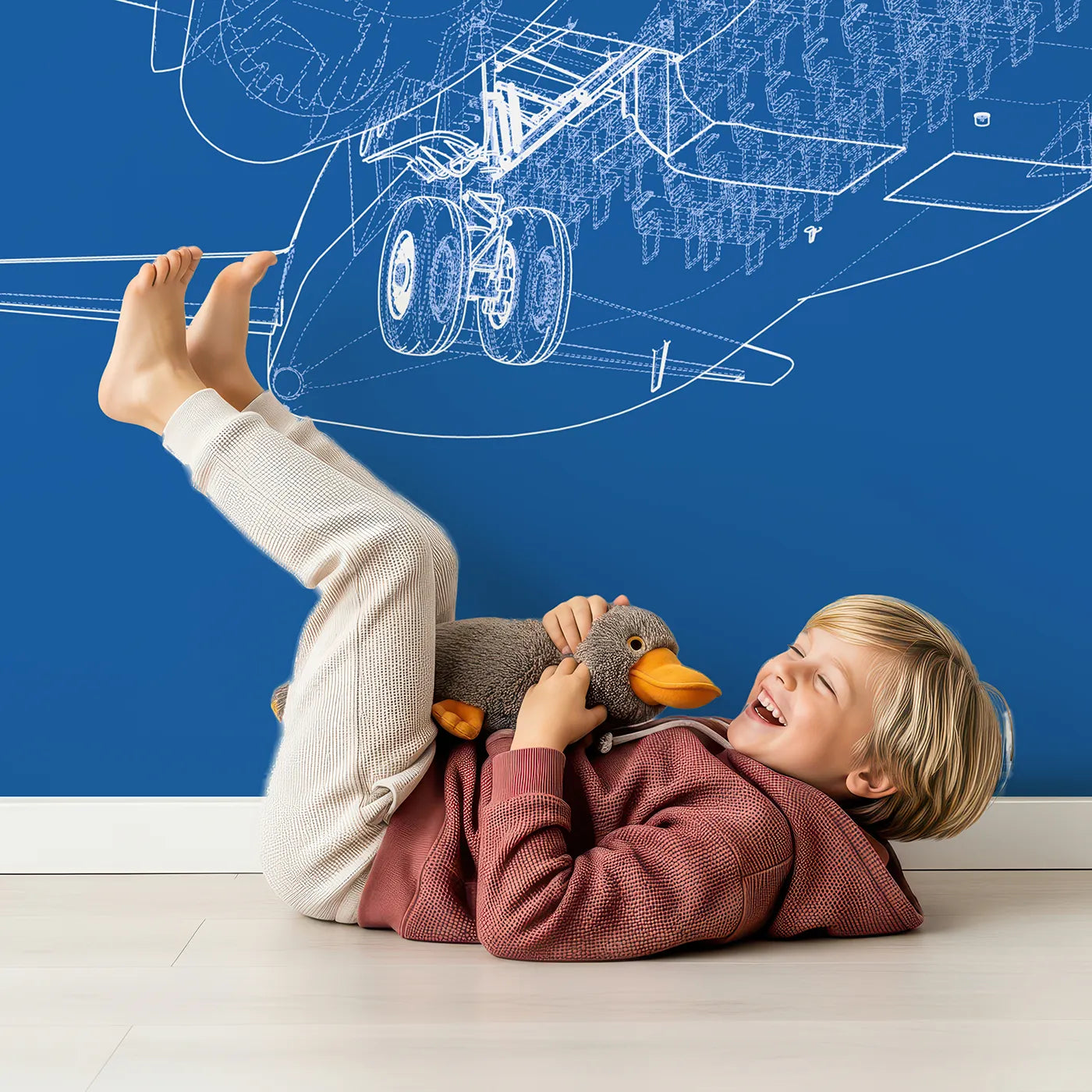 Child in front of Whimsy Tots Airplane Blueprint Wall Mural with airplane, blueprint, wireframe, technical, engineering, plane, blue, stem in design.