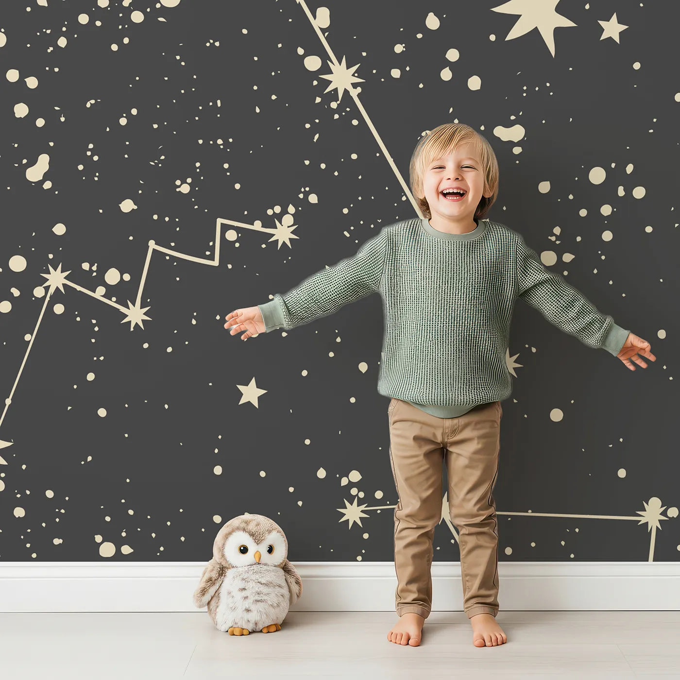 Child in front of Whimsy Tots Vintage Constellation Map Wall Mural with star, constellation, space, vintage, map, planet, galaxy, astronomy in design.