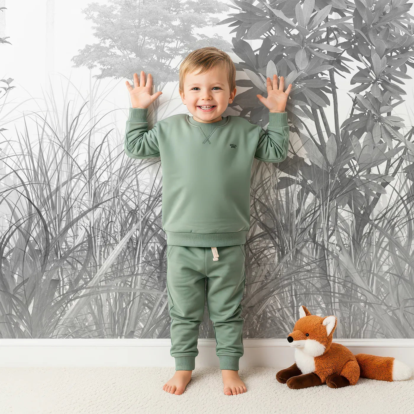 Child in front of Whimsy Tots Misty Pine Forest Wall Mural in Grayscale with forest, mist, tree, pine, fog, black and white, monochrome, woods in design.