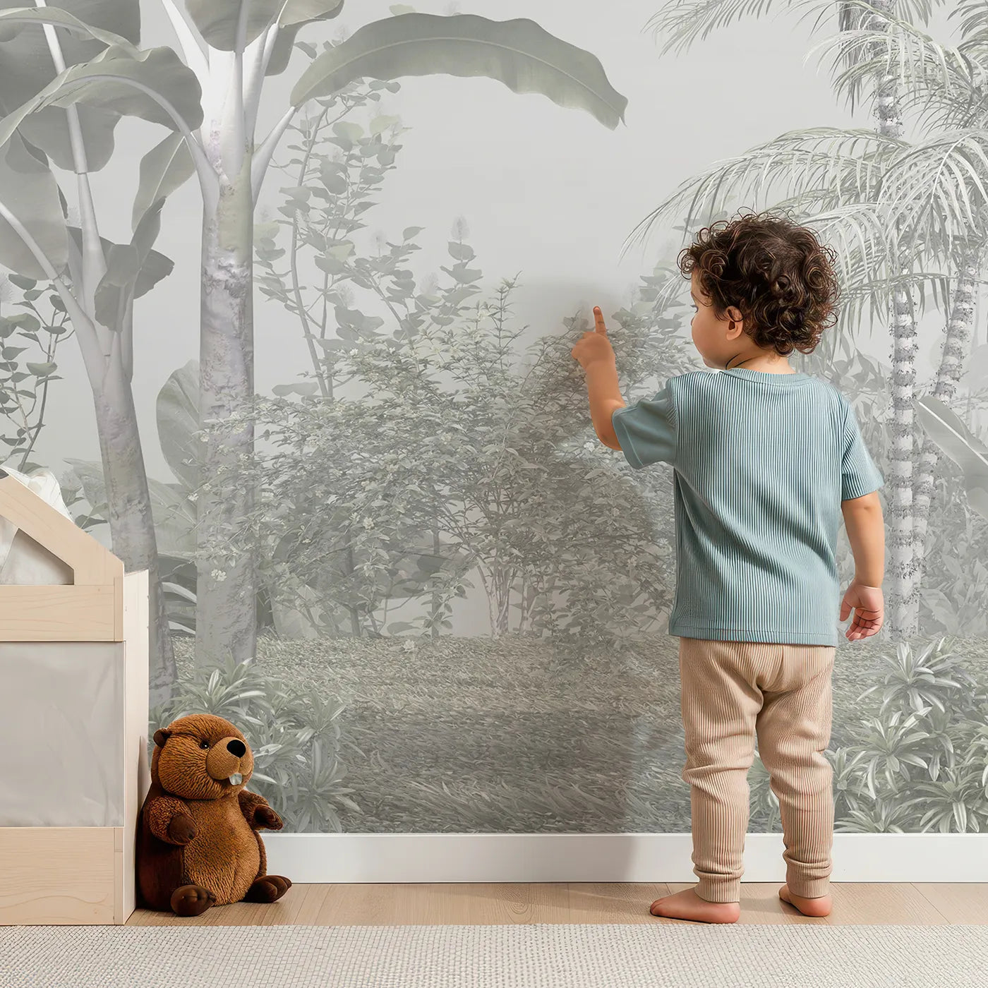 Child in front of Whimsy Tots Misty White Jungle Wall Mural with jungle, tropical, white, gray, mist, forest, palm tree, pale in design.