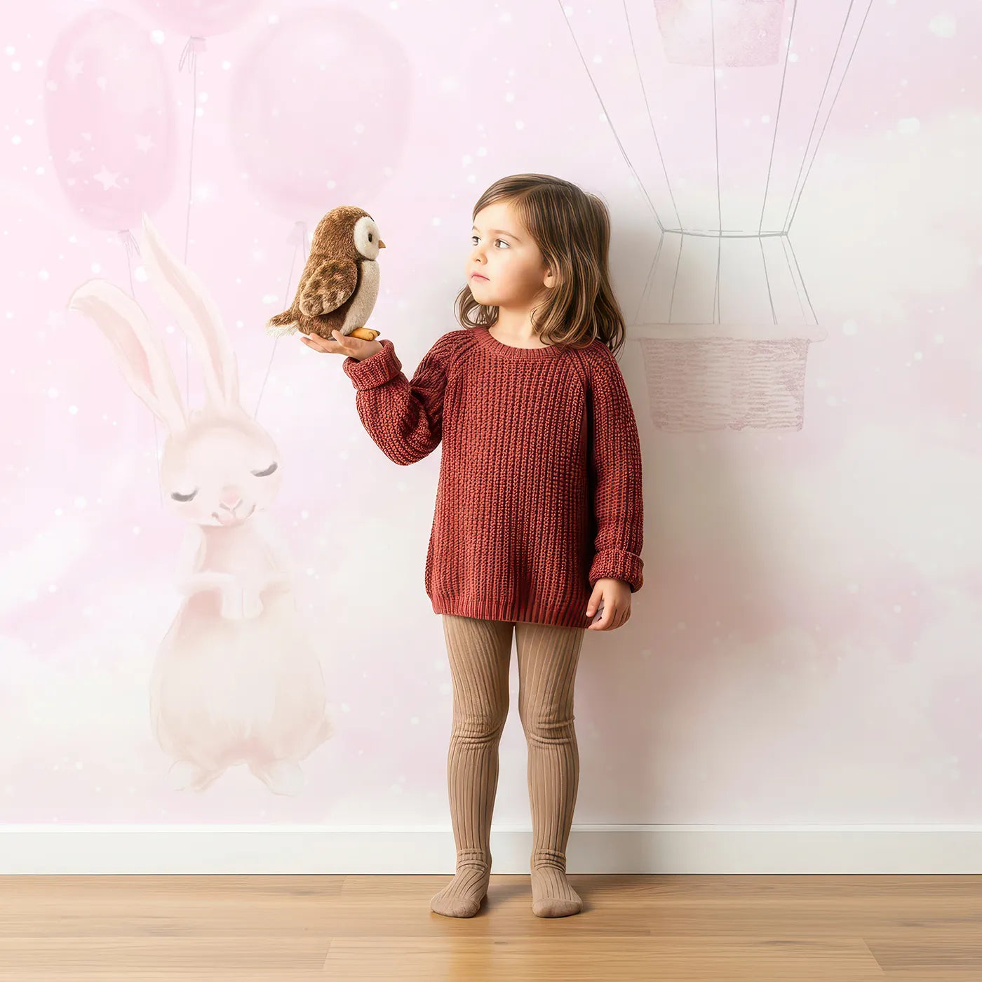 Child in front of Whimsy Tots Pink Bunny Balloon Sky Wall Mural with bunny, rabbit, balloon, hot air balloon, pink, sky, cute, sparkle in design.