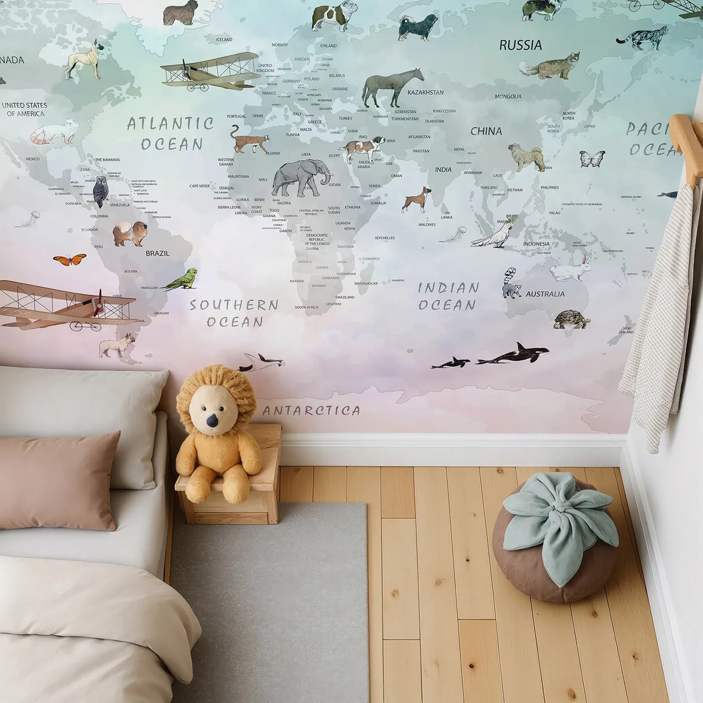 Top-down view of Whimsy Tots' Vintage Pet Aviator World Map Wall Mural (Turn Their Room into a Whimsical, Globe-Trotting Adventure).Gender-Neutral
