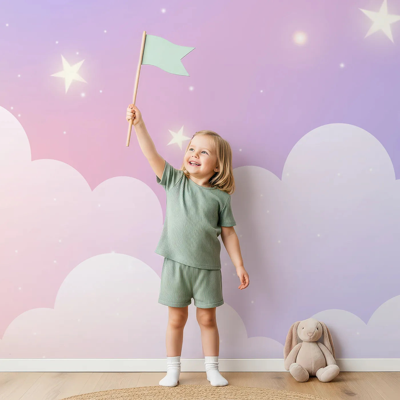 Child in front of Whimsy Tots Pastel Rainbow Starry Sky Wall Mural with pastel, rainbow, star, gradient, sky, soft, dreamy, sparkle in design.
