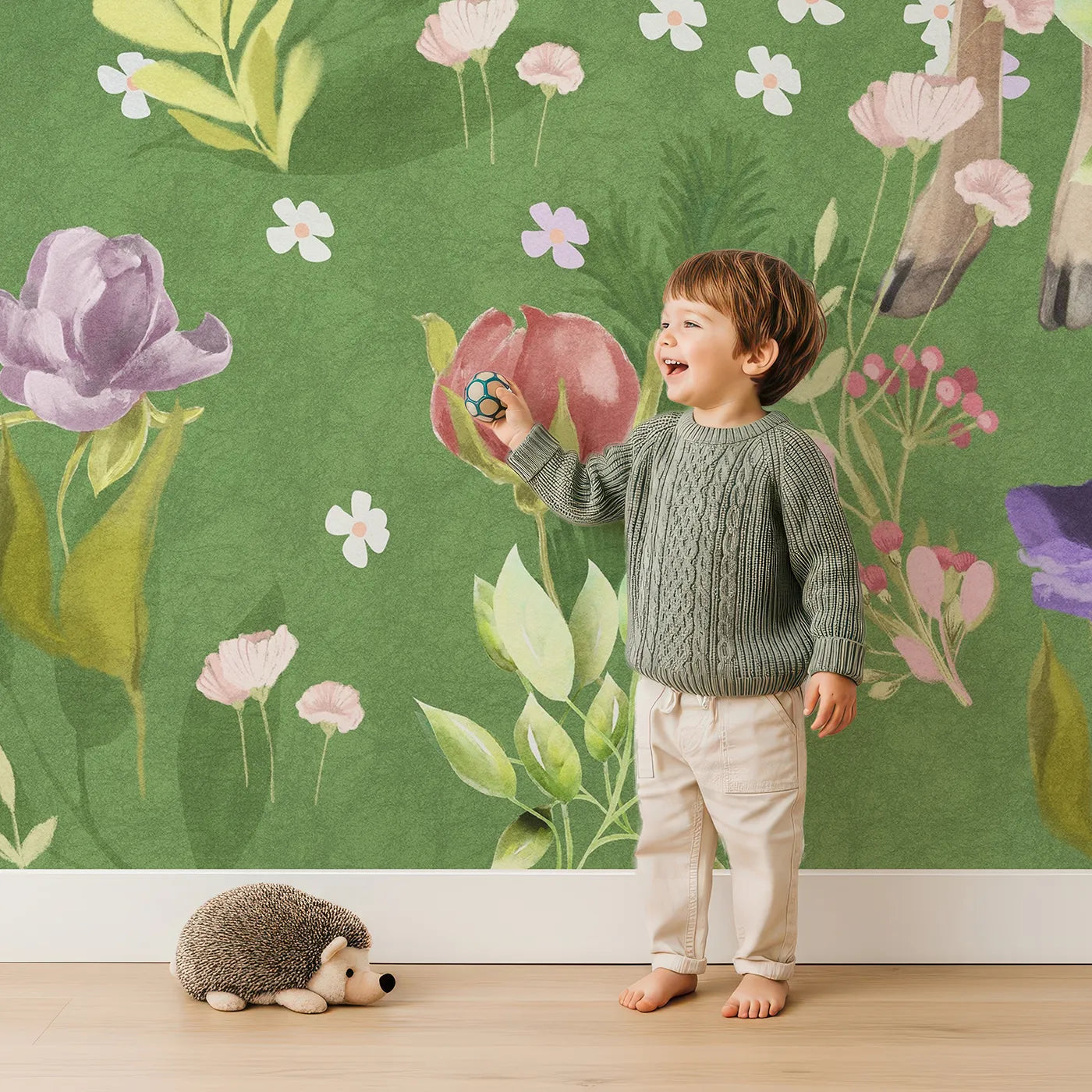 Child in front of Whimsy Tots Fawns in the Flower Field Wall Mural with deer, fawn, animal, flower, meadow, cute, realistic, woodland in design.