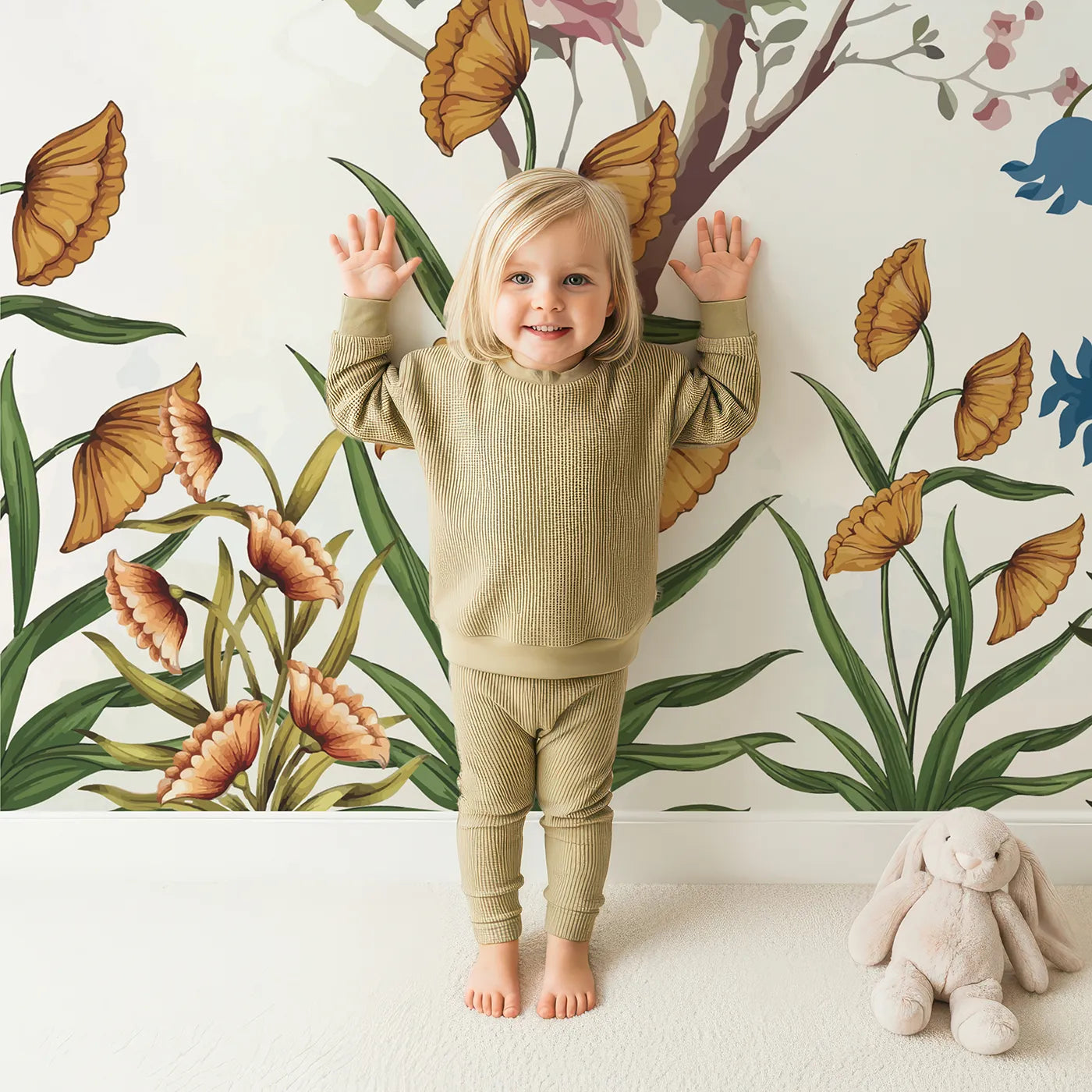 Child in front of Whimsy Tots Chinoiserie Garden Wall Mural with chinoiserie, vintage, floral, flower, bird, tree, classic, elegant in design.