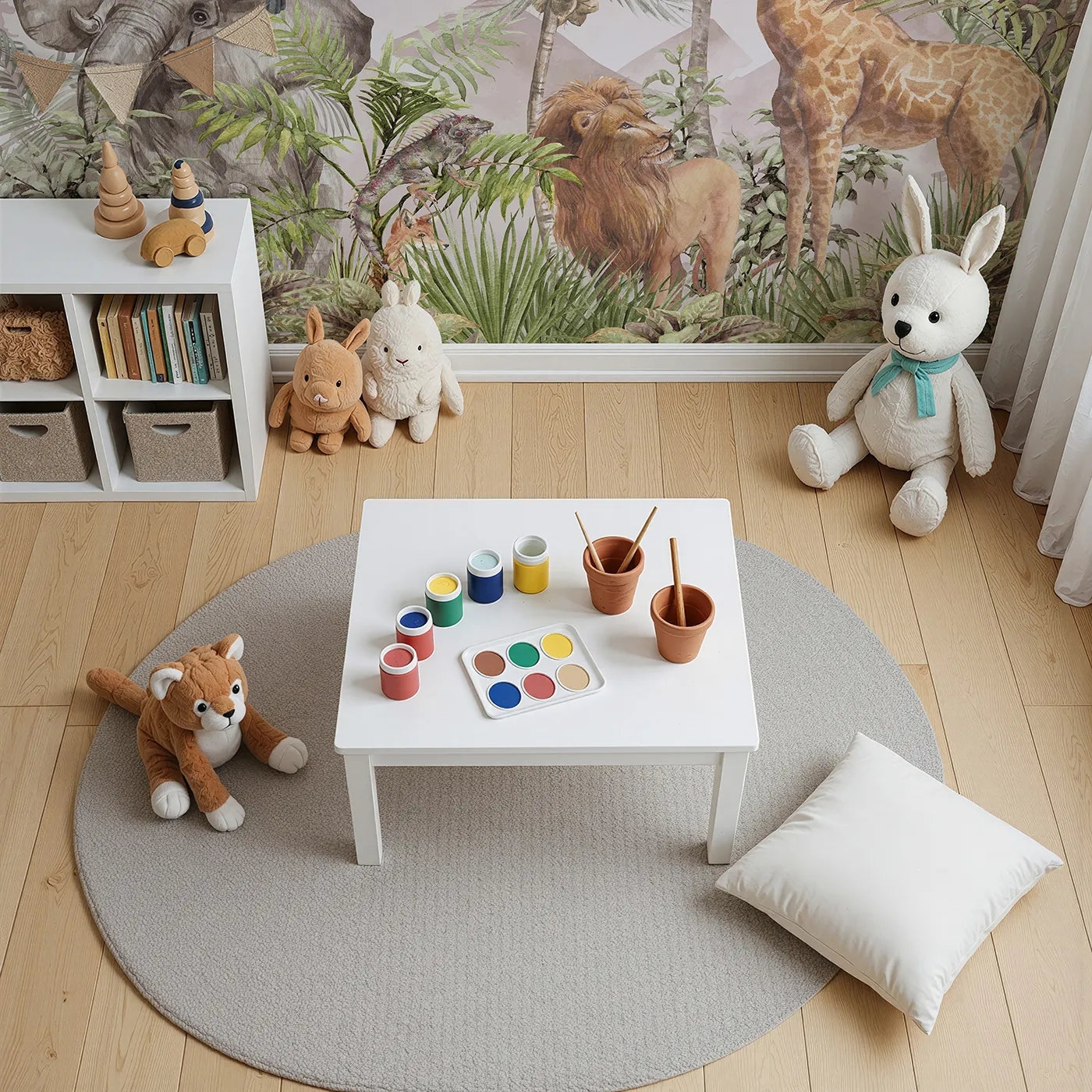 Top-down view of Whimsy Tots' Watercolor Safari Wall Mural in Pink (Turn Their Room into a Majestic, Painted Jungle).Gender-Neutral