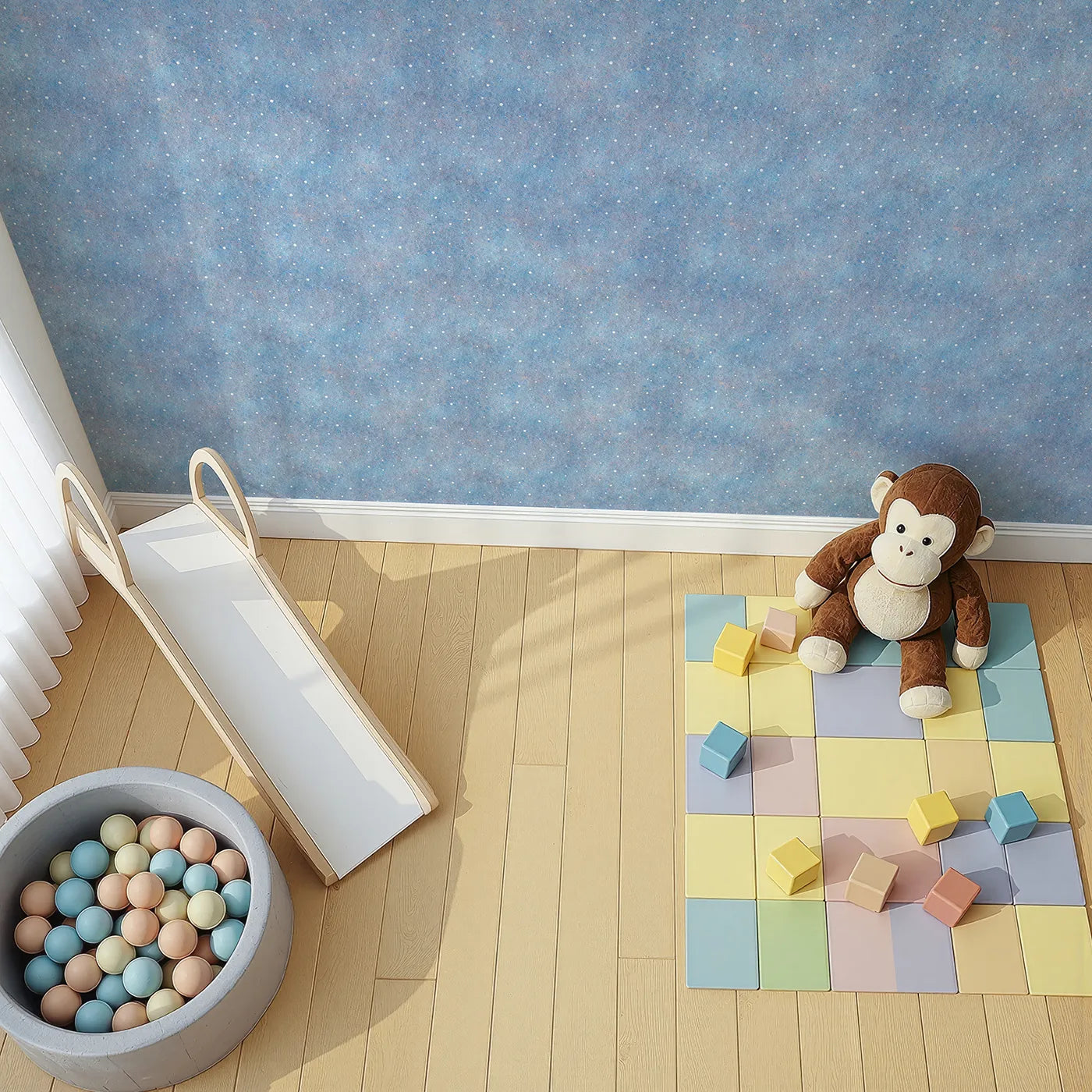 Top-Down view of Whimsy Tots' First Snowfall Wallpaper in Blue (W2014).Where the first soft snowflakes fall in a quiet, blue sky.