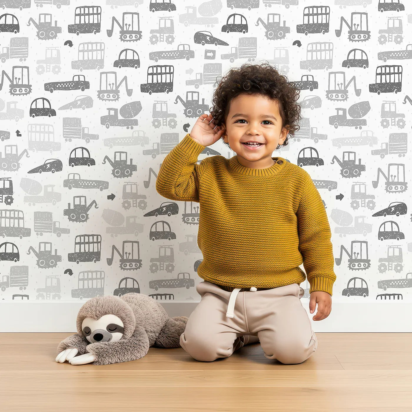 Lovely child standing in front of Whimsy Tots Monochrome Vehicle Mashup Wallpaper with car, truck, vehicle, city, construction in design.