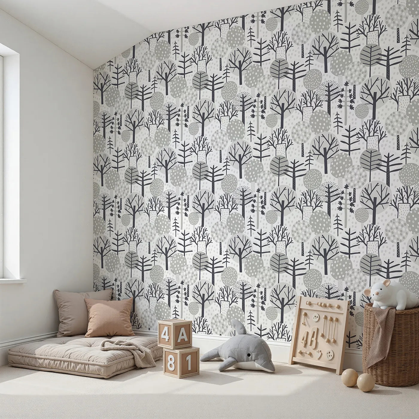 Angled view of Whimsy Tots' Monochrome Winter Forest Wallpaper (W2071).Where stylized trees create a calm and graphic winter scene.