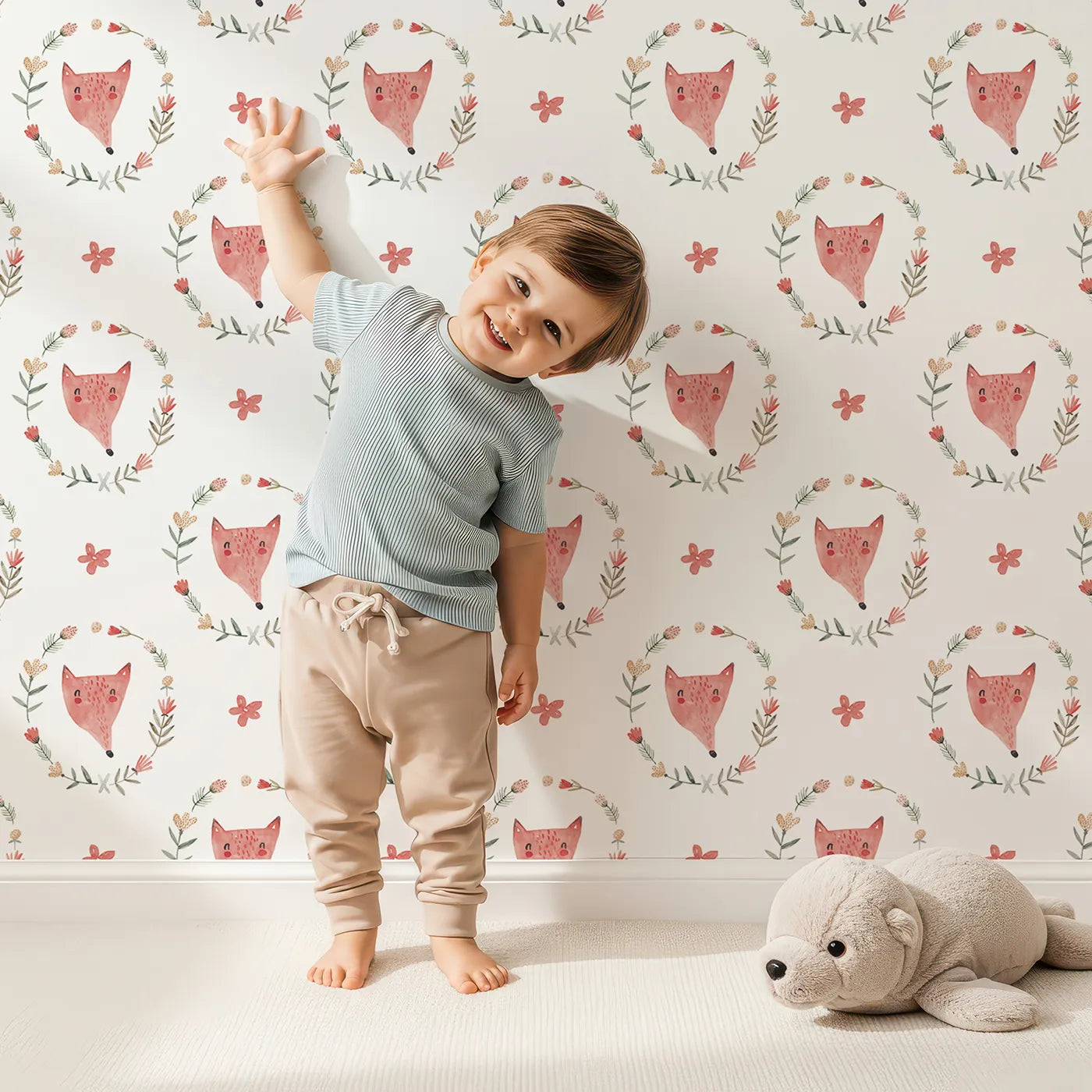 Lovely child standing in front of Whimsy Tots Watercolor Fox Portrait Wallpaper with fox, wreath, flower, watercolor, woodland in design.