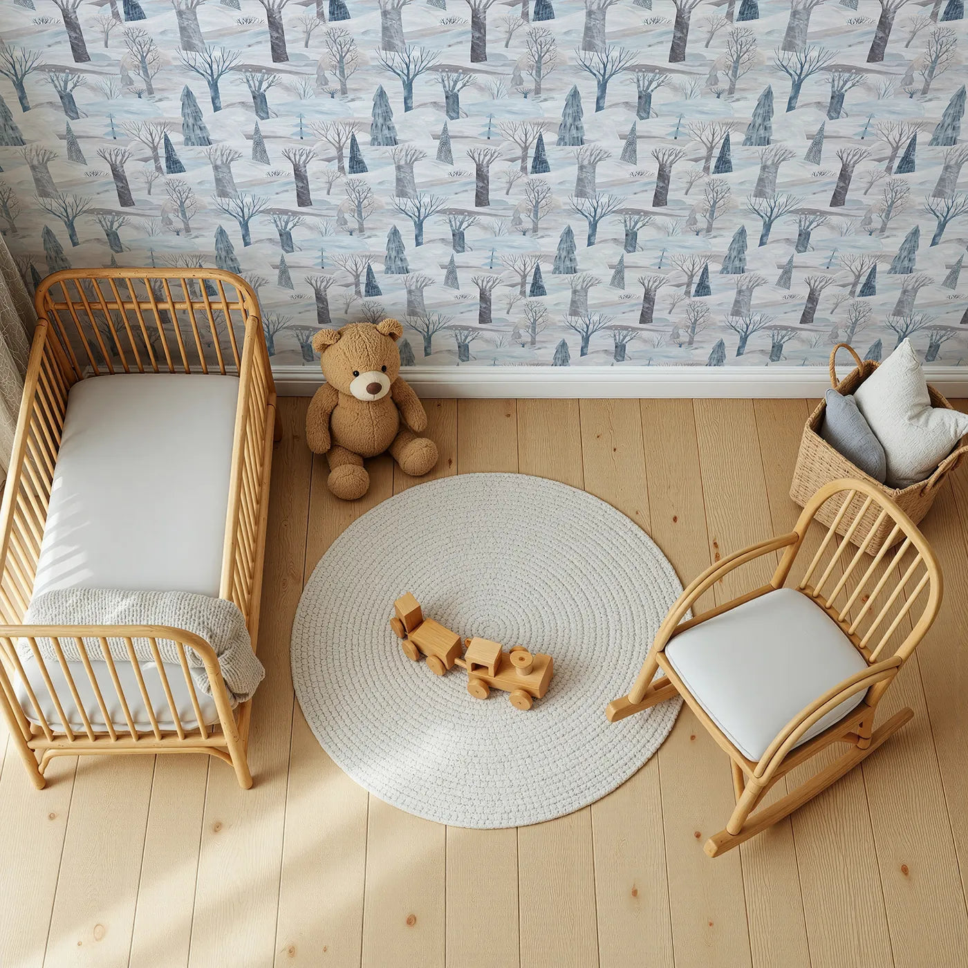 Top-Down view of Whimsy Tots' Painted Nordic Winter Wallpaper (W2166).Where bare trees stand silently in a vast, painted snowscape.