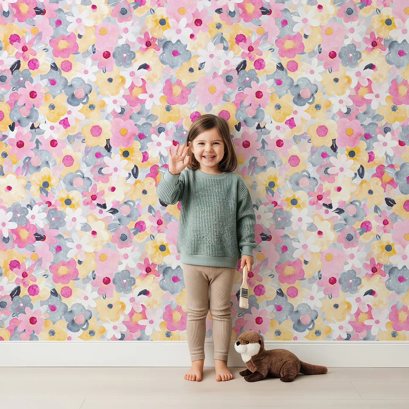 Lovely child standing in front of Whimsy Tots Abstract Floral Burst Wallpaper with flower, floral, abstract, watercolor, colorful in design.