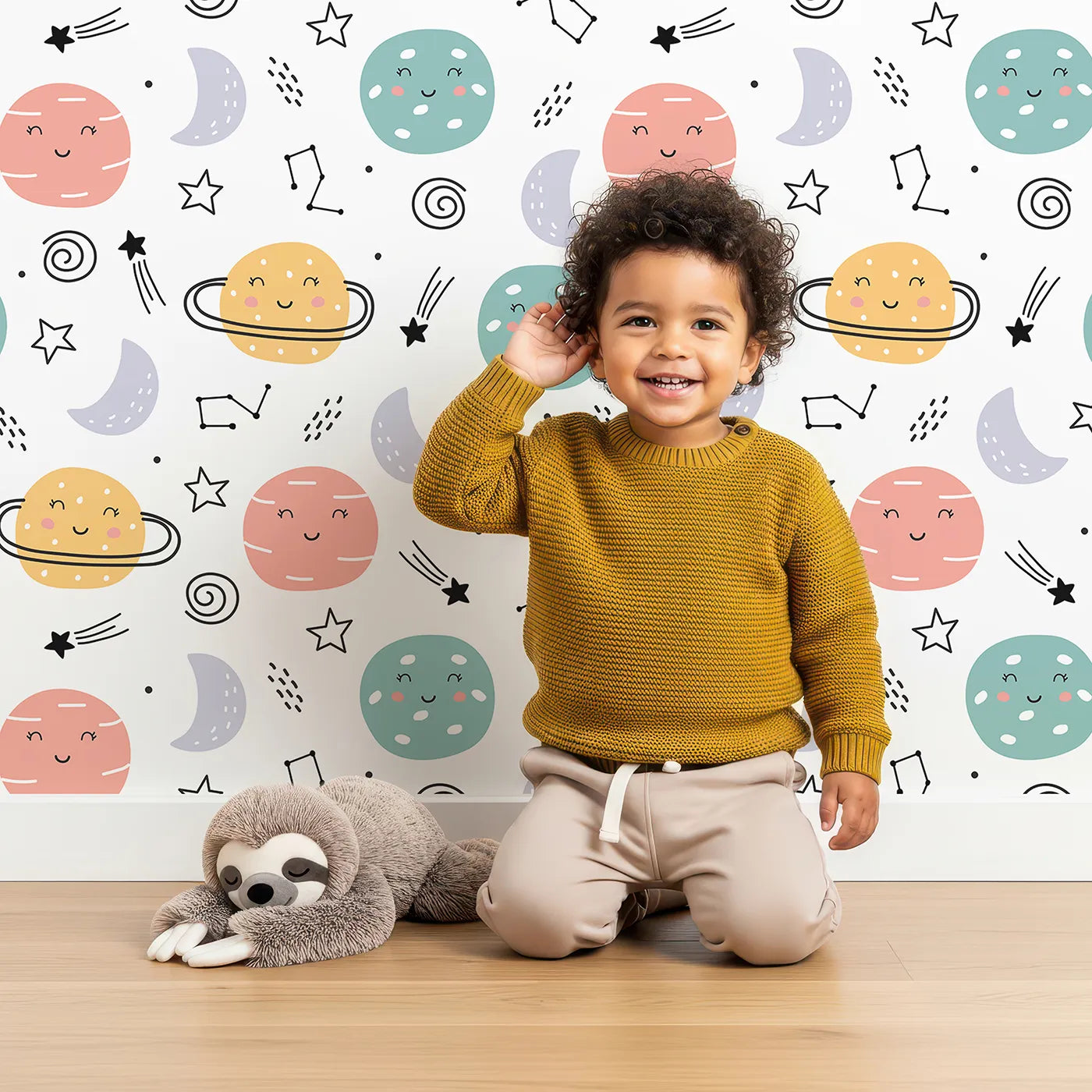 Lovely child standing in front of Whimsy Tots Happy Planet Pals Wallpaper with planet, space, star, moon, cute in design.