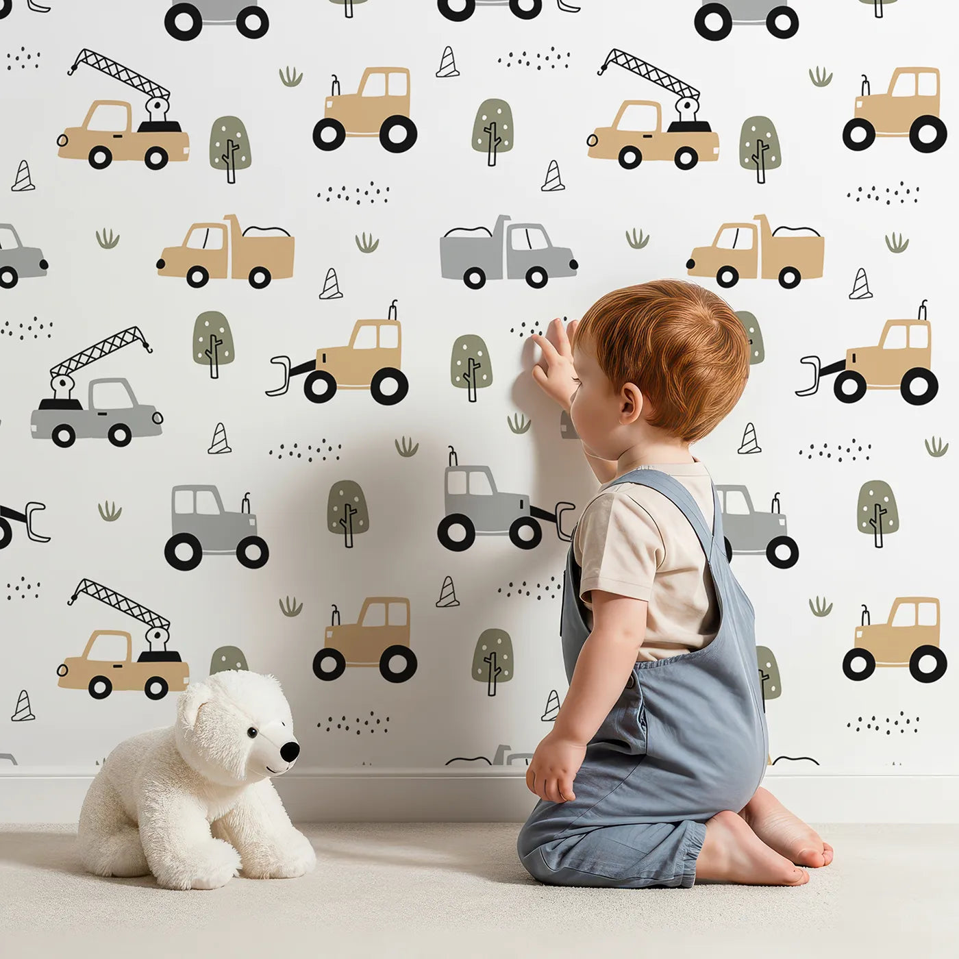 Lovely child standing in front of Whimsy Tots Neutral Construction Trucks Wallpaper with construction, truck, tractor, modern, neutral in design.