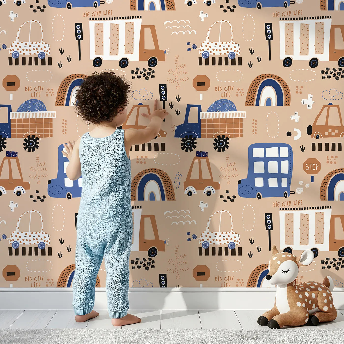 Lovely child standing in front of Whimsy Tots Big City Life Cars Wallpaper with city, car, truck, bus, boho in design.