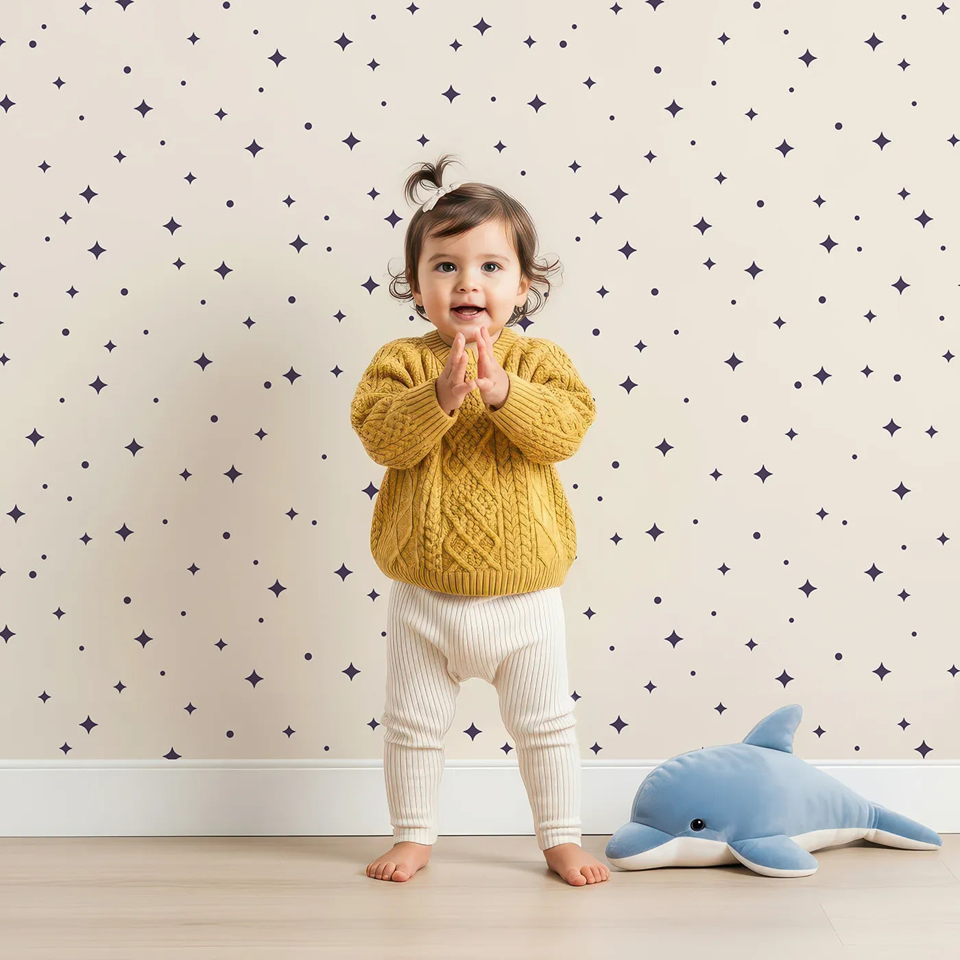 Lovely child standing in front of Whimsy Tots Minimalist Starry Night Wallpaper with star, night, sky, minimalist, space in design.