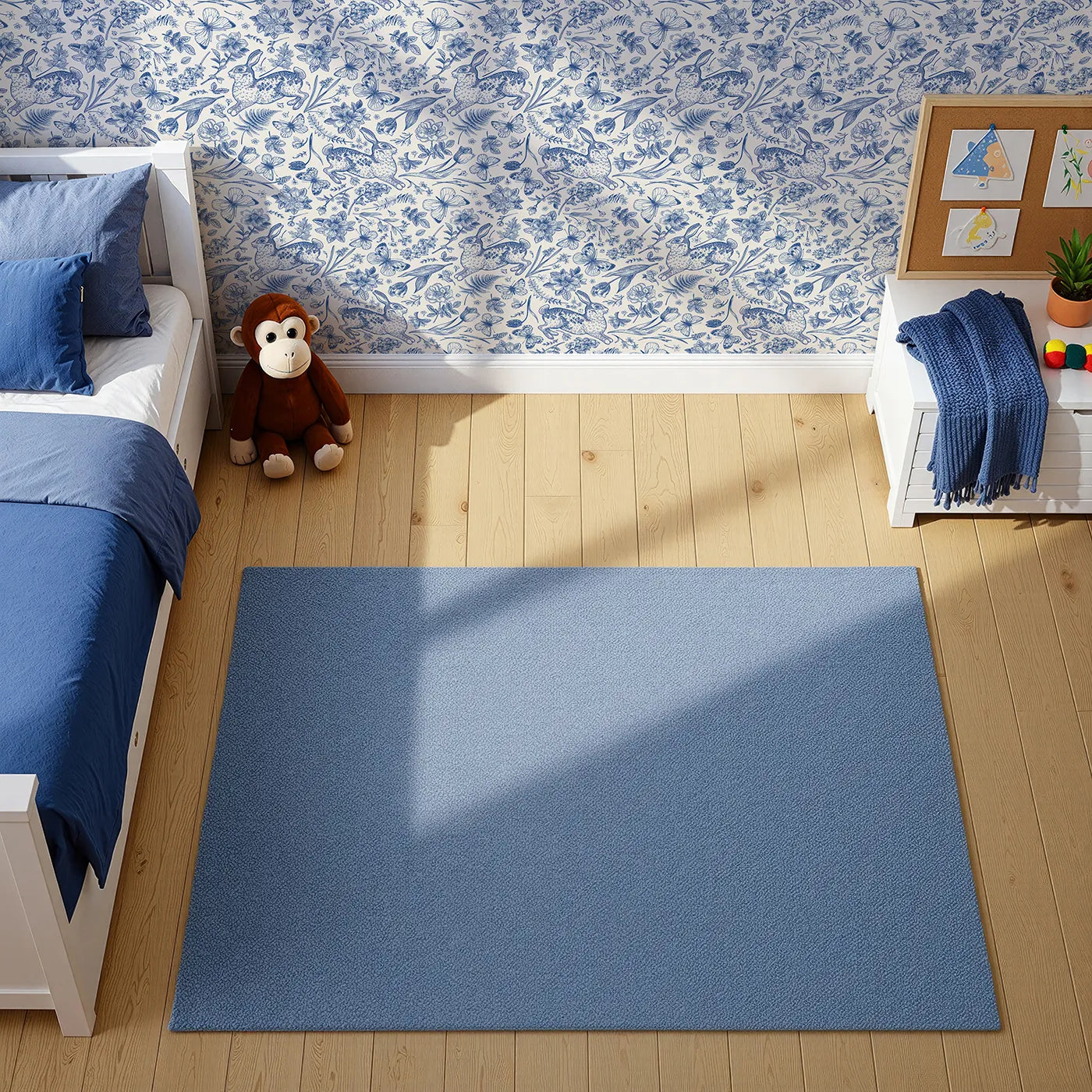 Top-Down view of Whimsy Tots' Vintage Rabbit Toile Wallpaper in Blue (W2241).Where detailed, hand-drawn rabbits leap through a floral meadow.