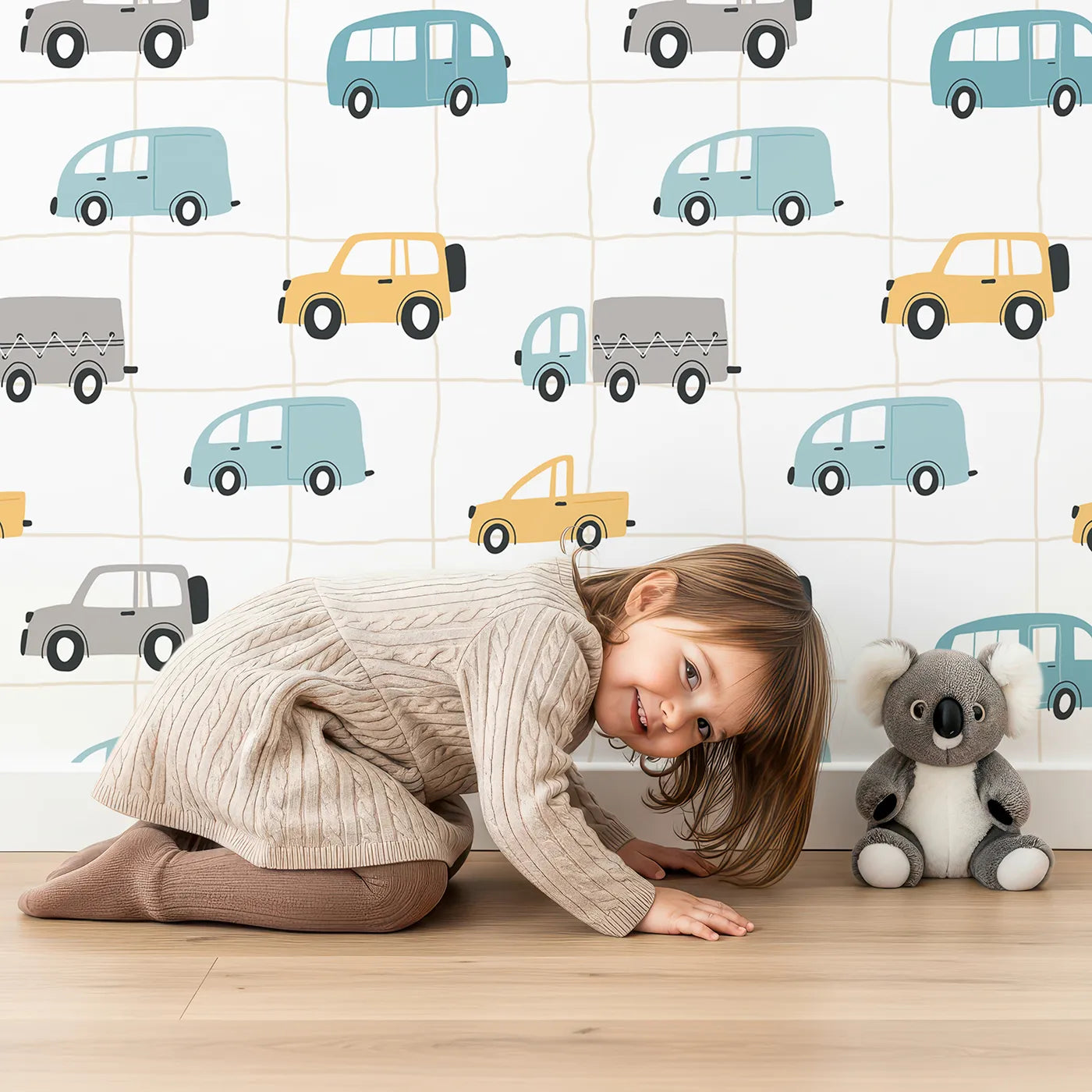 Lovely child standing in front of Whimsy Tots Gridlock Pals Car and Truck Wallpaper with car, truck, grid, modern, city in design.