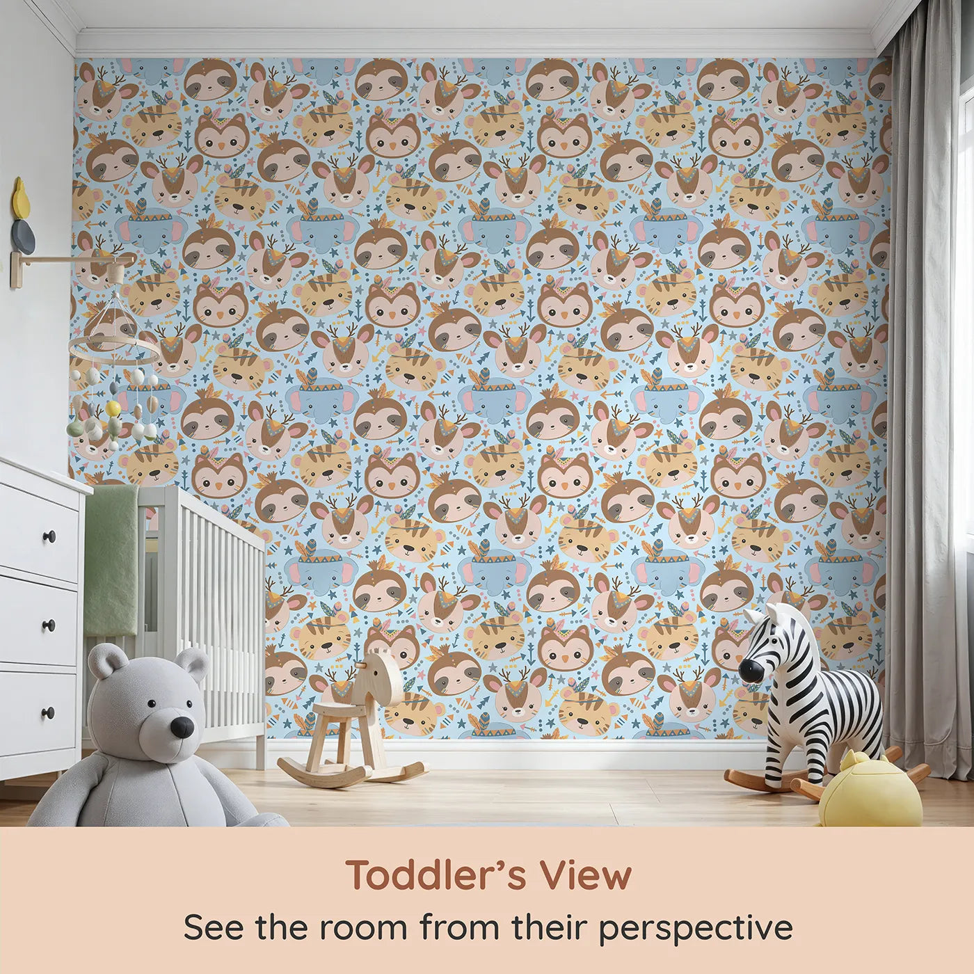 Whimsy Tots Wild Whimsy Tribe Wallpaper in Blue (W3012D) from your child's view.A joyful mix of animal faces, feathers, and arrows creates a world of wonder.