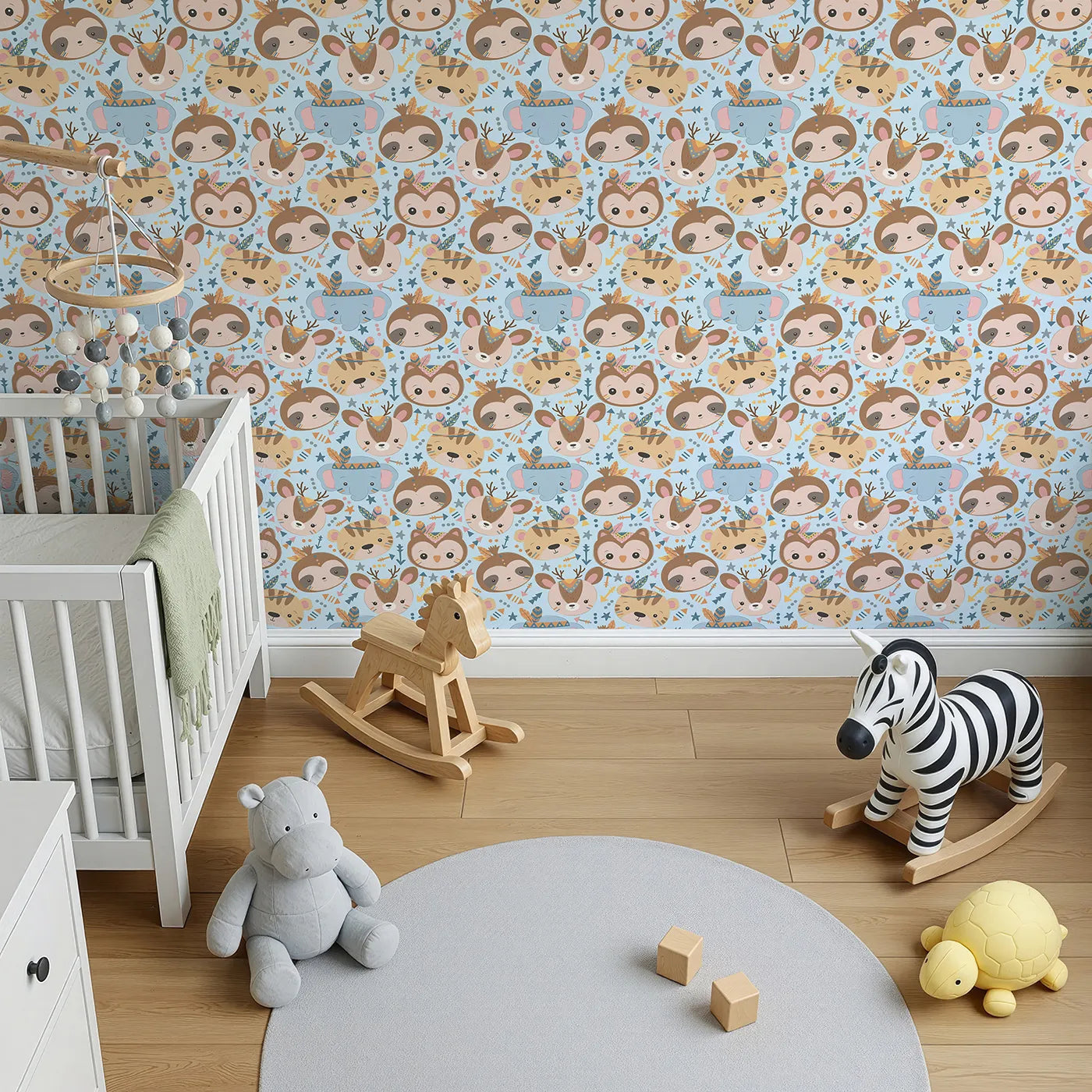 Top-Down view of Whimsy Tots' Wild Whimsy Tribe Wallpaper in Blue (W3012D).A joyful mix of animal faces, feathers, and arrows creates a world of wonder.