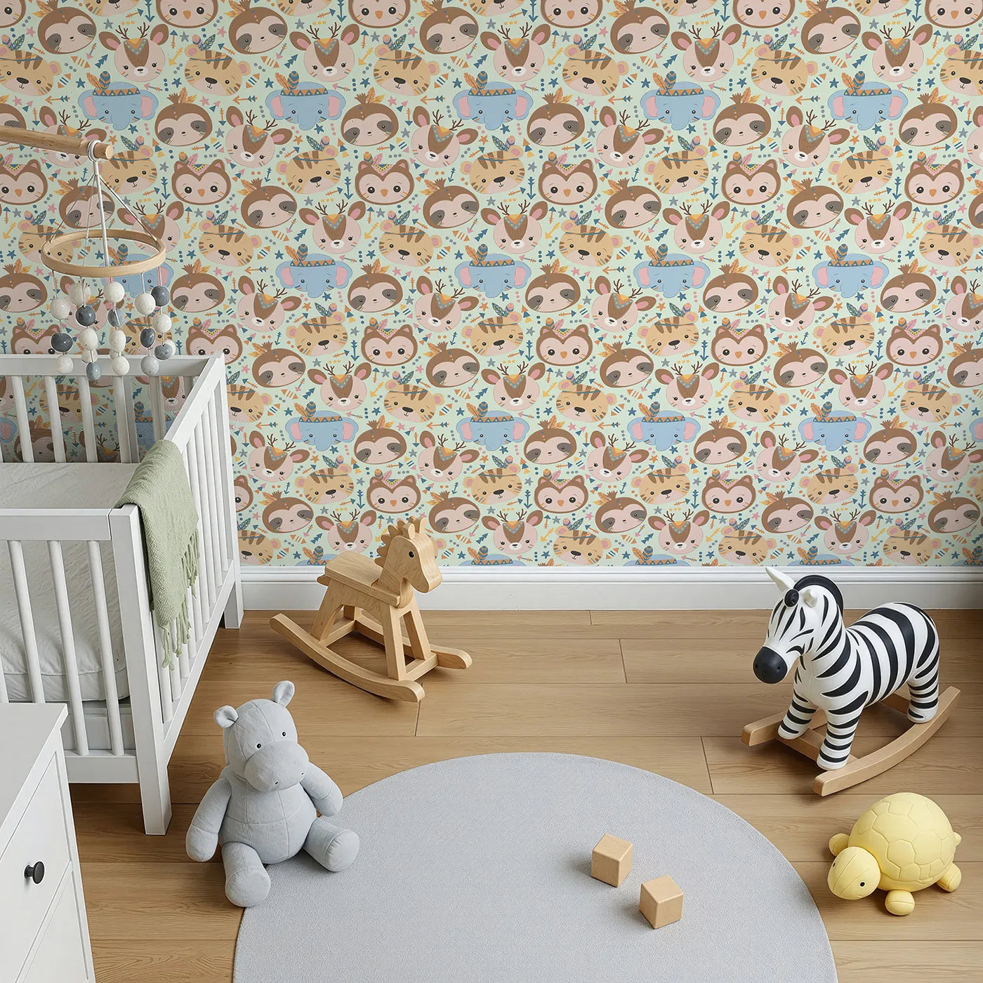 Top-Down view of Whimsy Tots' Wild Whimsy Tribe Wallpaper in Mint Green (W3012E).A joyful mix of animal faces, feathers, and arrows creates a world of wonder.