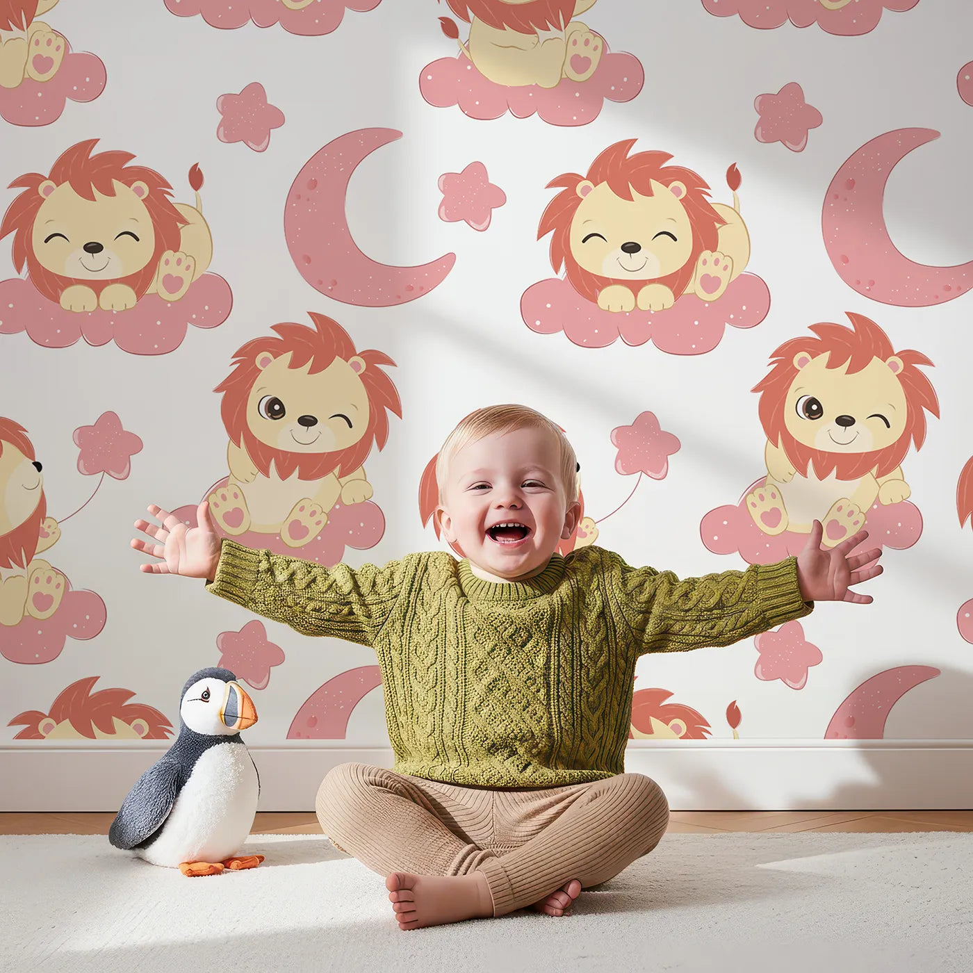 Lovely child standing in front of Whimsy Tots Starry Safari Dreams Wallpaper in Pink with lion, cloud, moon, star in design.
