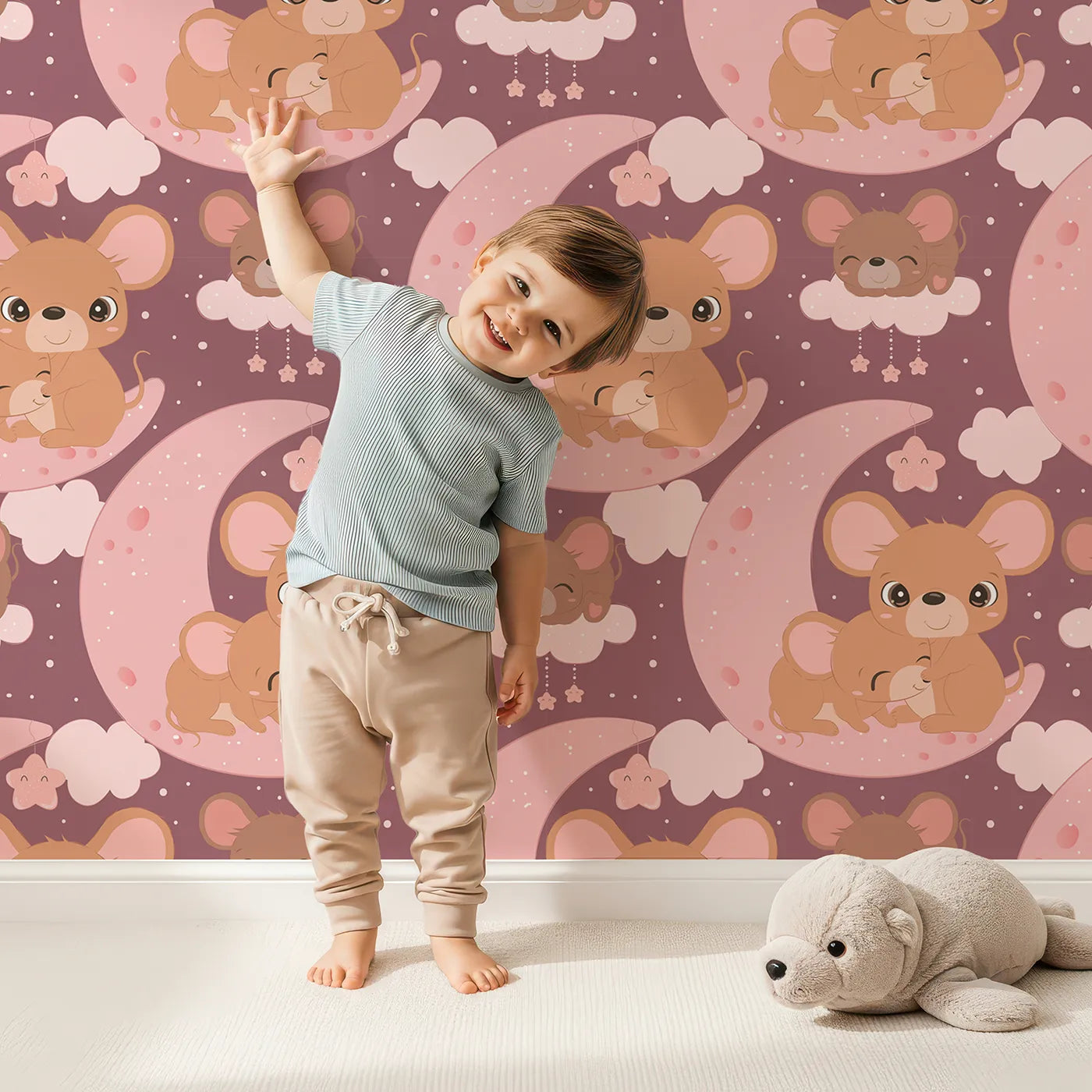 Lovely child standing in front of Whimsy Tots Moonlight Mouse Cuddles Wallpaper in Plum with mouse, moon, cloud, star in design.
