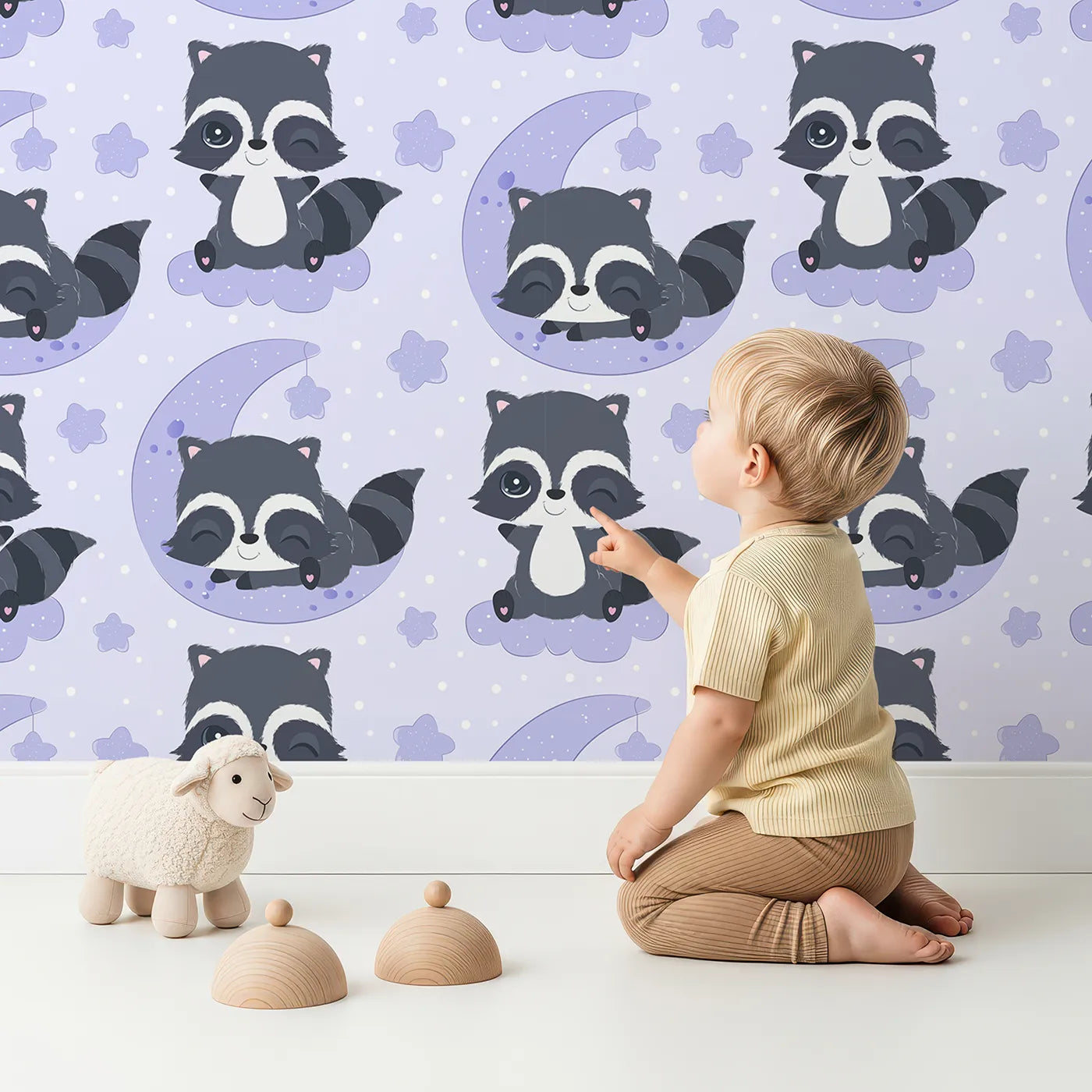 Lovely child standing in front of Whimsy Tots Moonbeam Raccoon Dreams Wallpaper in Purple with raccoon, moon, cloud, star in design.