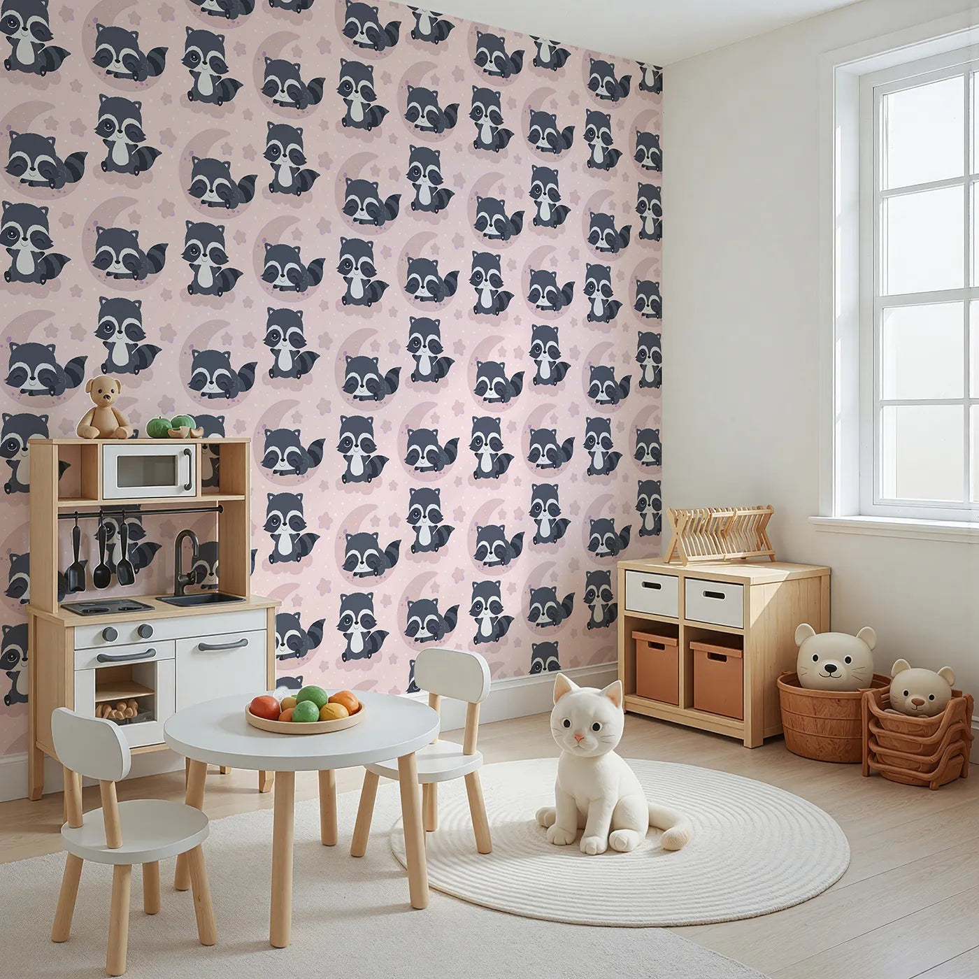 Angled view of Whimsy Tots' Moonbeam Raccoon Dreams Wallpaper in Pink (W3026B).Sleepy raccoons and starlit skies make every nap feel magical.