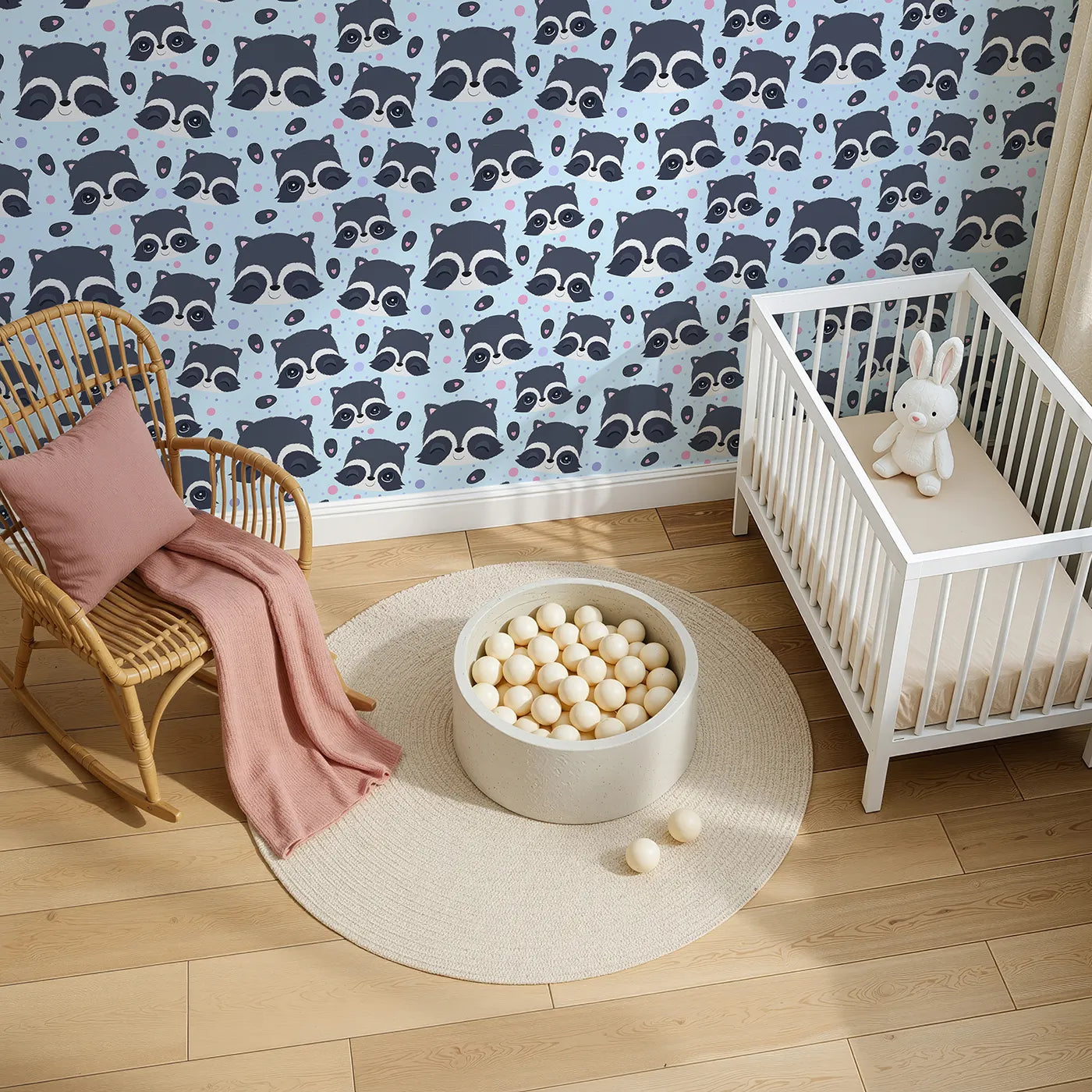 Top-Down view of Whimsy Tots' Winkie Raccoon Pals Wallpaper in Blue (W3030E).Winking raccoons and soft sprinkles fill the room with joy.
