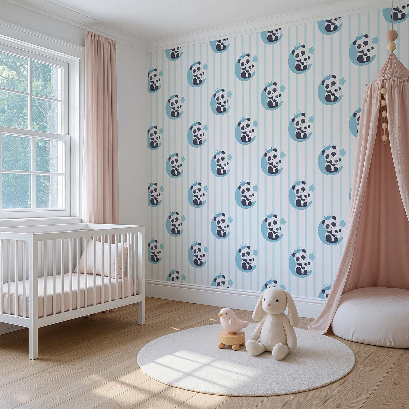 Angled view of Whimsy Tots' Moon Cuddle Panda Wallpaper in Blue (W3037A).A cuddly panda duo rests on the moon, under soft stripes and starry skies.