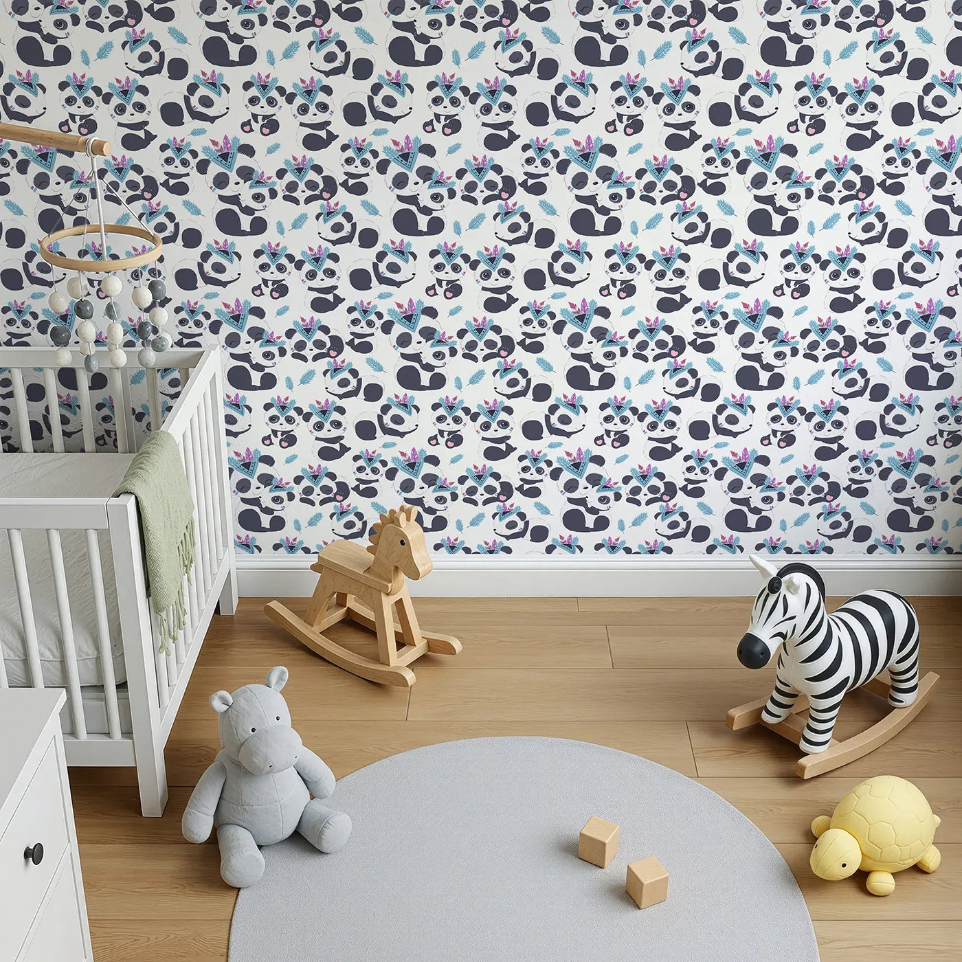 Top-Down view of Whimsy Tots' Tribal Hug Panda Wallpaper in White (W3040A).Feather-crowned pandas share hugs and giggles across a soft white sky.