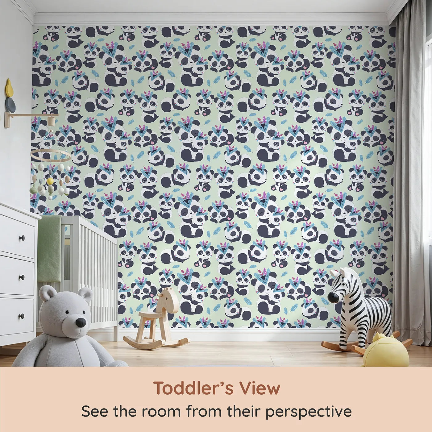 Whimsy Tots Tribal Hug Panda Wallpaper in Mint Green (W3040D) from your child's view.Smiling pandas in tribal feathers play on a gentle minty green field.