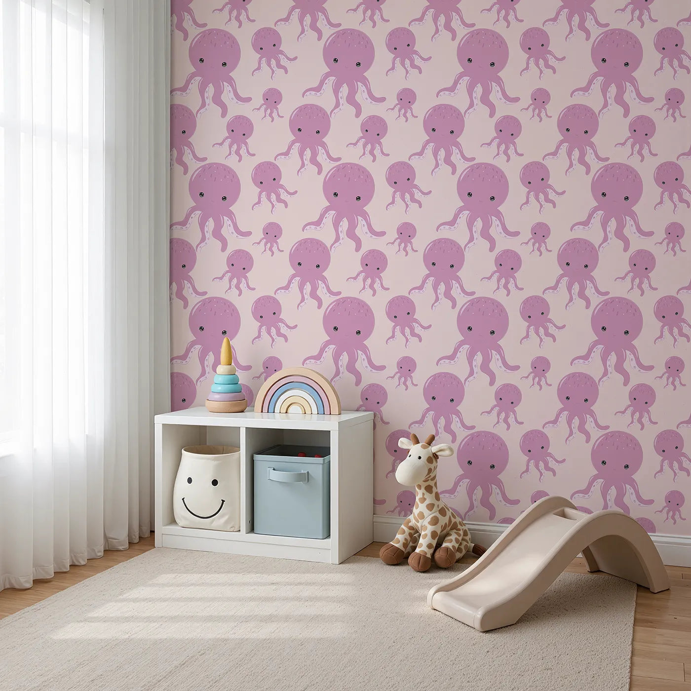 Angled view of Whimsy Tots' Ocean Bubbles Octopus Wallpaper in Blush Pink (W3041B).Smiling pink octopuses float gently across a rosy sea of calm.