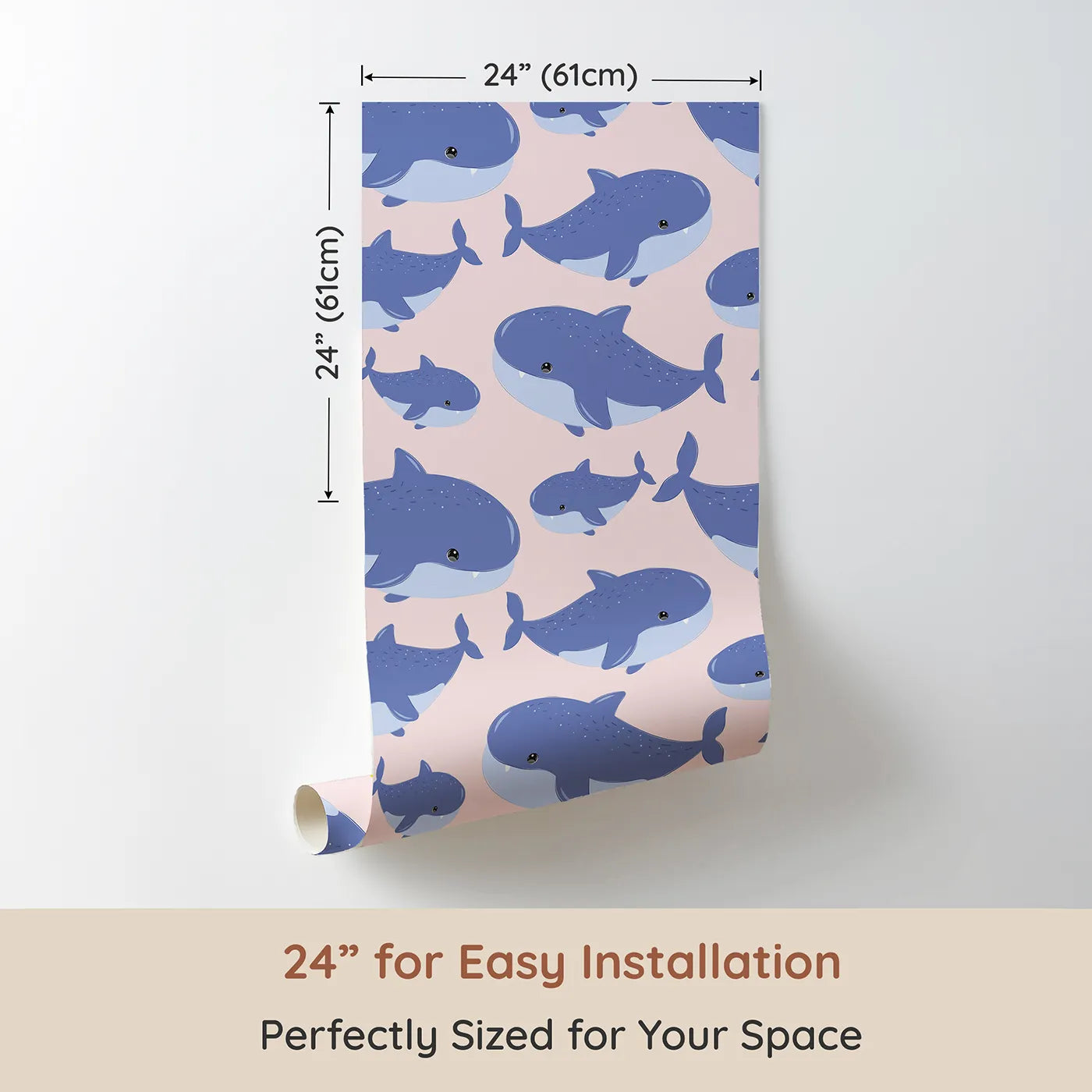 Dimension view of Whimsy Tots Whale Shark Wiggles Wallpaper in Blush Pink (W3043B). Printed in 24-inch-wide panel for easy installation. Smiley whale sharks swim through a rosy pink sea of calm.