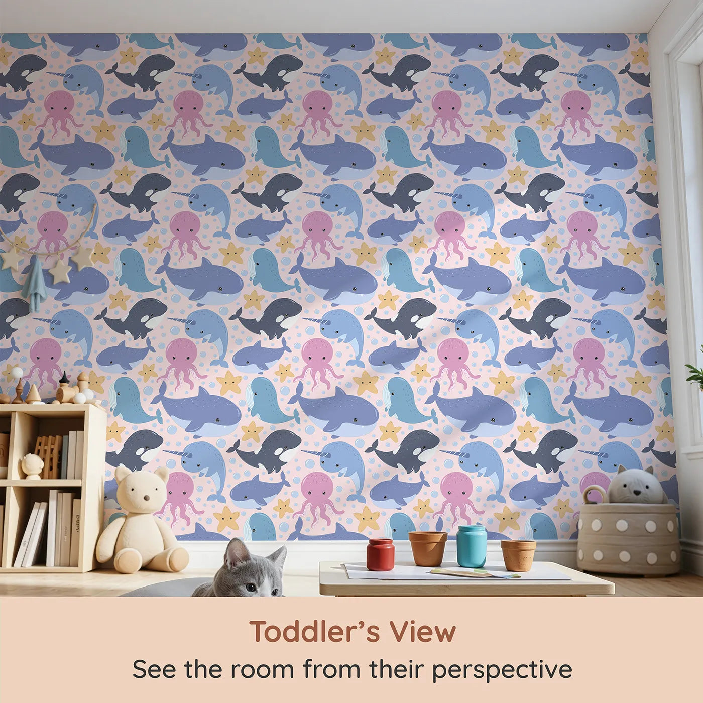 Whimsy Tots Ocean Buddy Parade Wallpaper in Blush Pink (W3046B) from your child's view.Happy sea creatures splash and swirl across a soft blush sea.