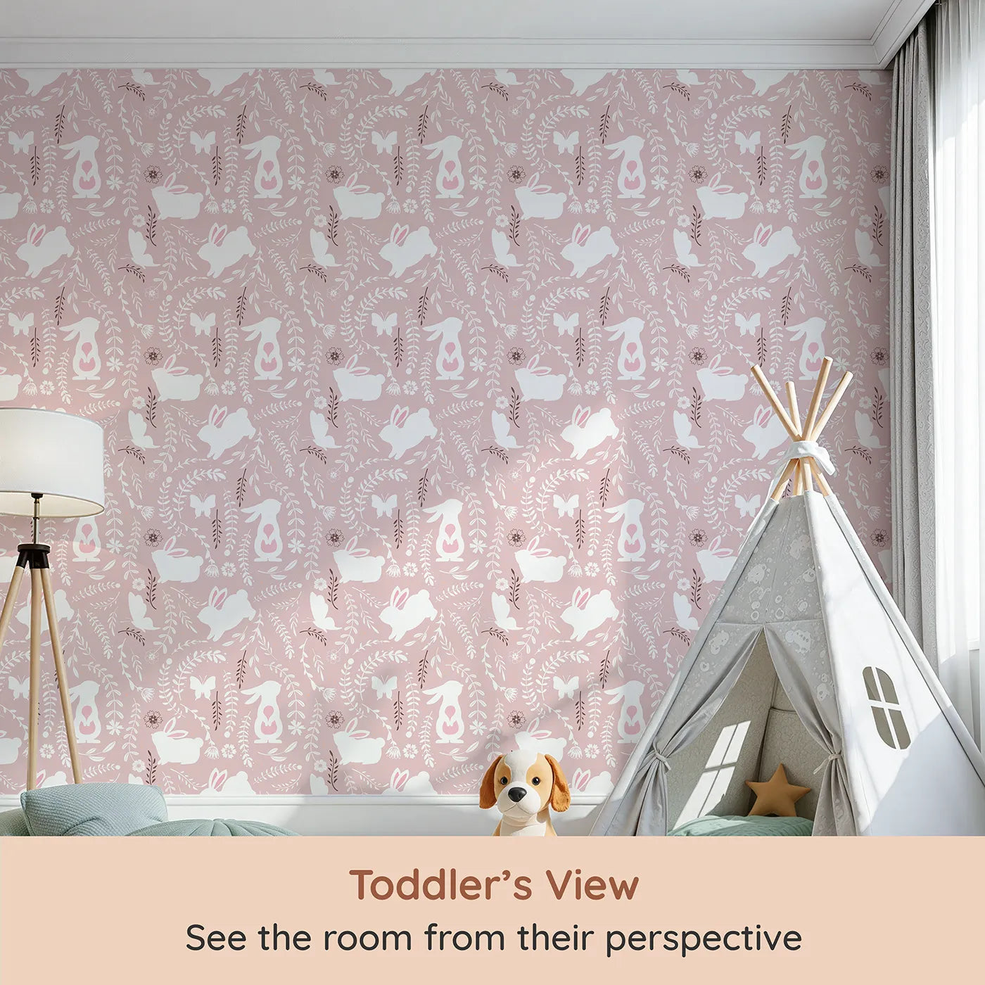 Whimsy Tots Bunny Hideaway Meadow Wallpaper in Blush Pink (W3050B) from your child's view.White bunnies hop among soft vines and floral silhouettes on a gentle blush field.