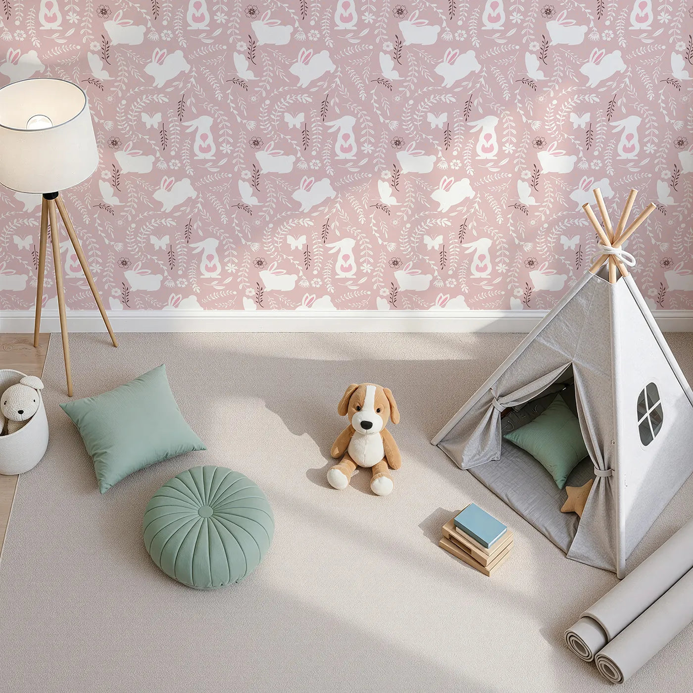 Top-Down view of Whimsy Tots' Bunny Hideaway Meadow Wallpaper in Blush Pink (W3050B).White bunnies hop among soft vines and floral silhouettes on a gentle blush field.