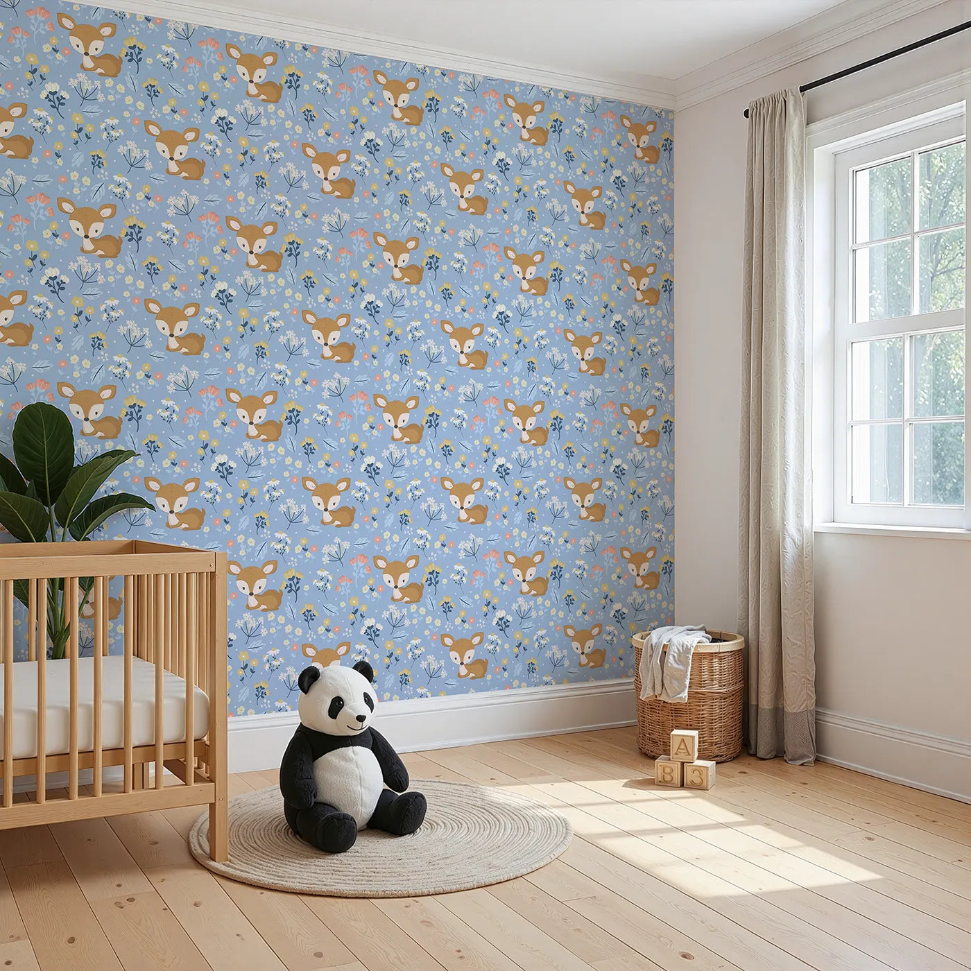 Angled view of Whimsy Tots' Meadow Cuddles Deer Wallpaper in Cornflower Blue (W3059E).Quiet baby deer rest beneath blossoms on a cool cornflower blue background.