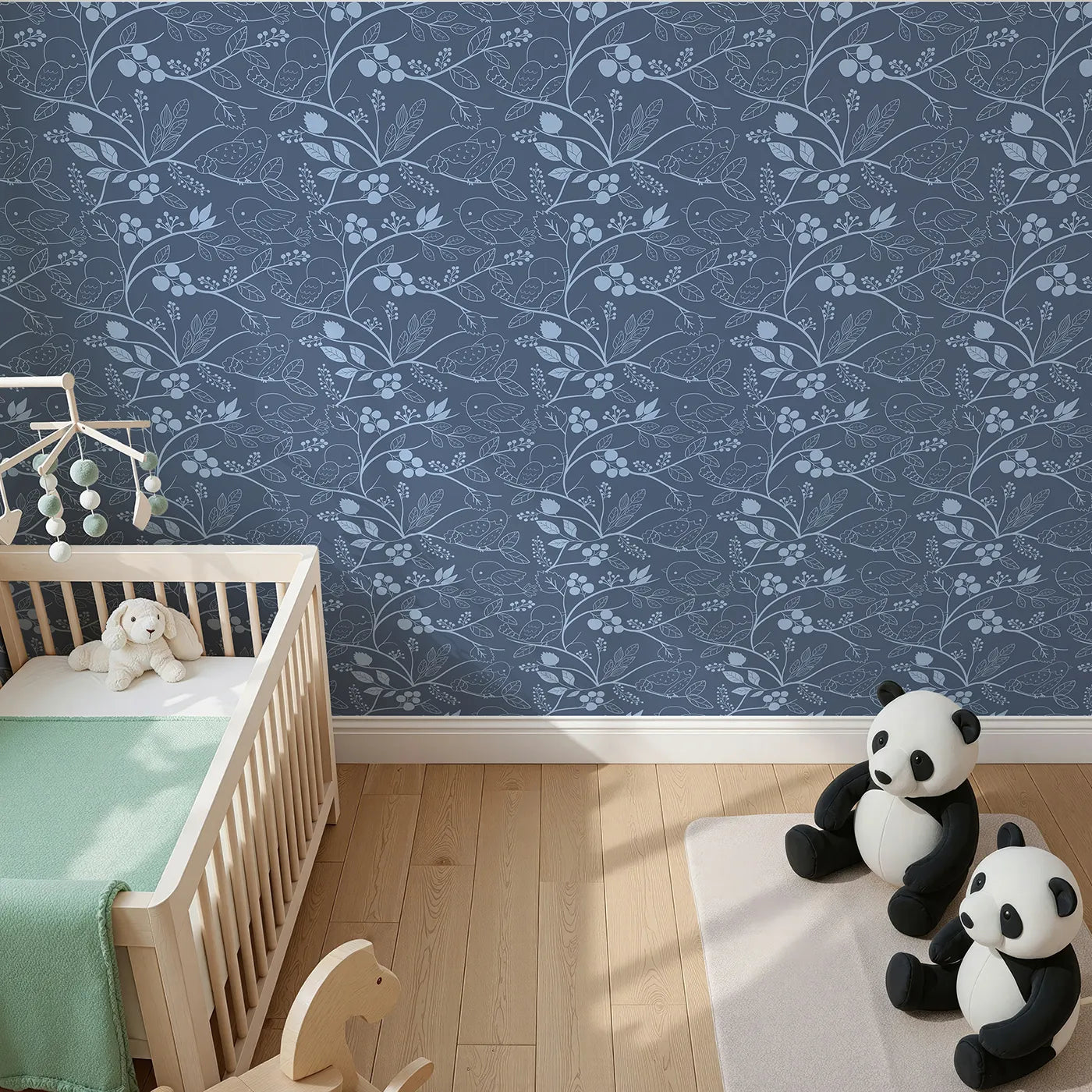Top-Down view of Whimsy Tots' Woodland Silhouette Birds Wallpaper in Blue (W3067B).Gentle bird outlines perch quietly along leafy blue vines.