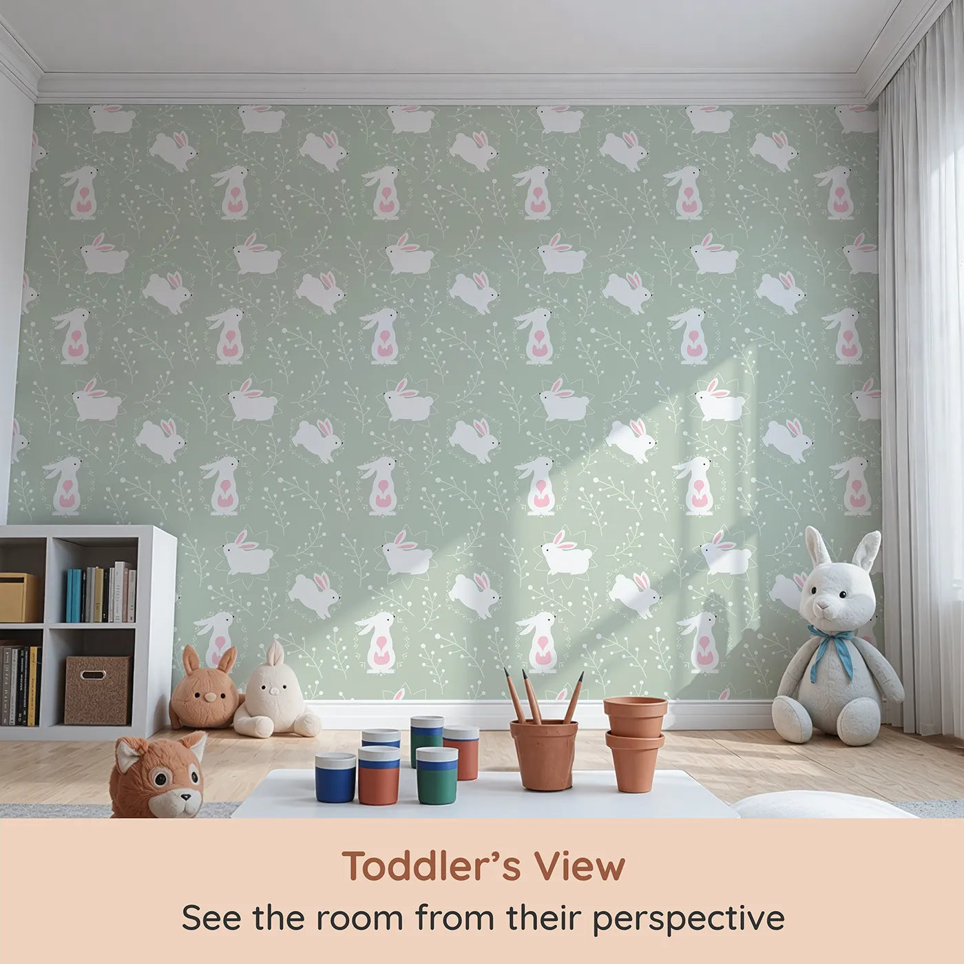 Whimsy Tots Tribal Bunny Sprigs Wallpaper in Sage Green (W3075C) from your child's view.White bunnies with soft tribal touches frolic through a peaceful sage green field.