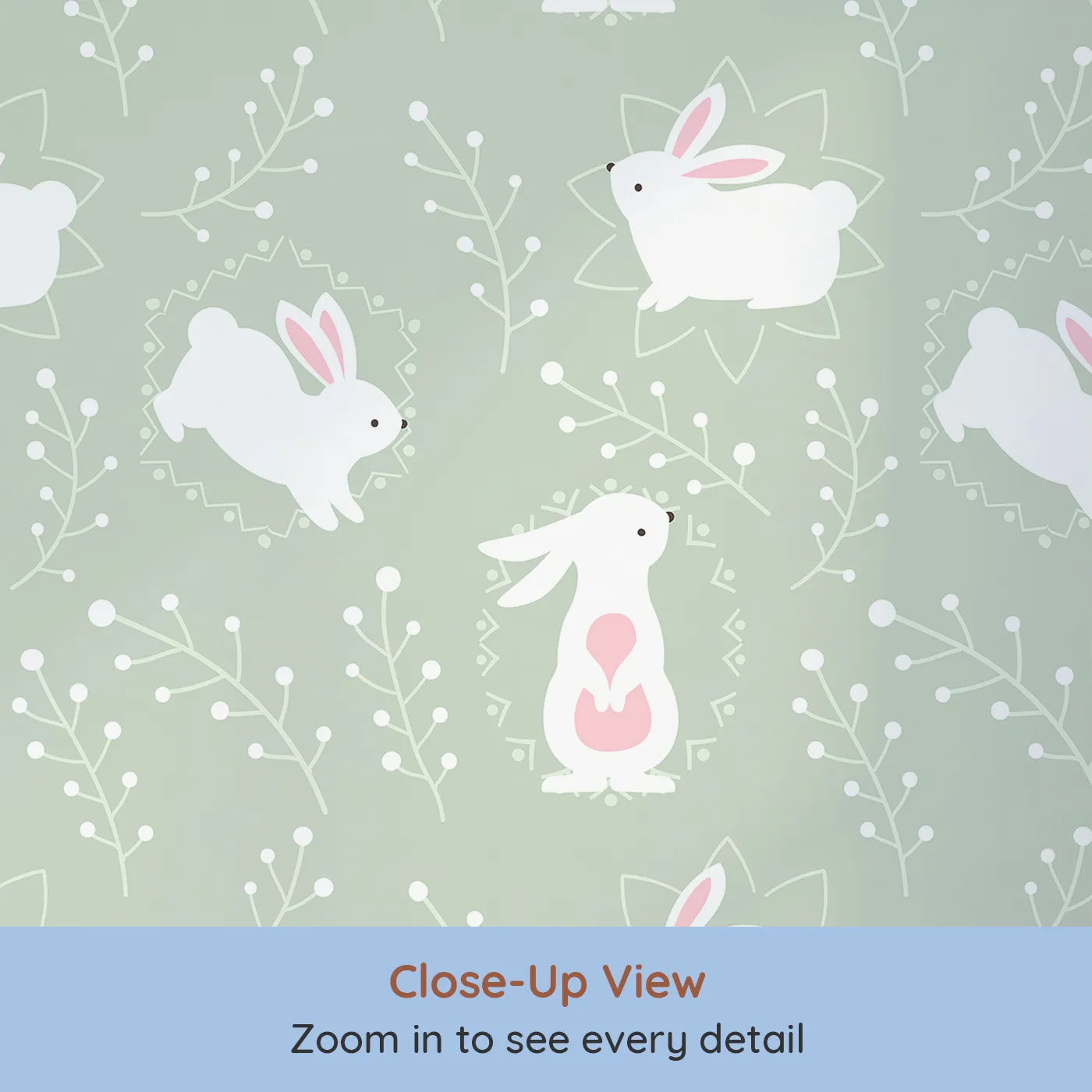 Close-up view of Whimsy Tots' Tribal Bunny Sprigs Wallpaper in Sage Green (W3075C).White bunnies with soft tribal touches frolic through a peaceful sage green field.